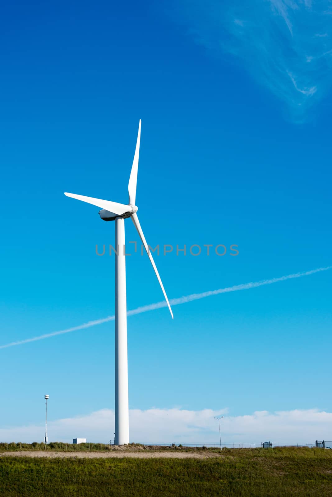 windmill in holland with blue sky