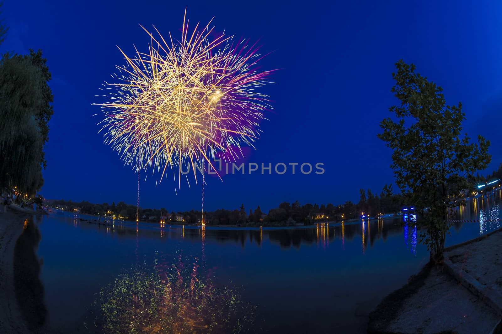 Fireworks on the river Ticino in a summer evening, Sesto Calende - Varese