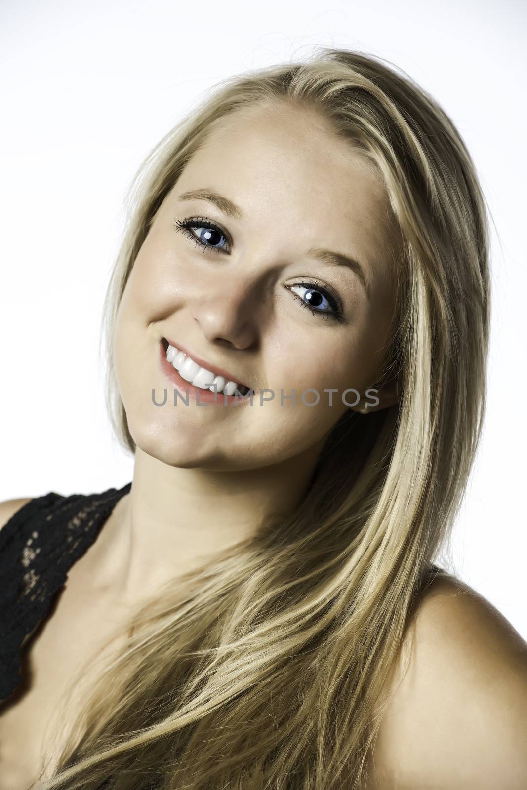 Pretty blond girl with blue eyes isolated on white background