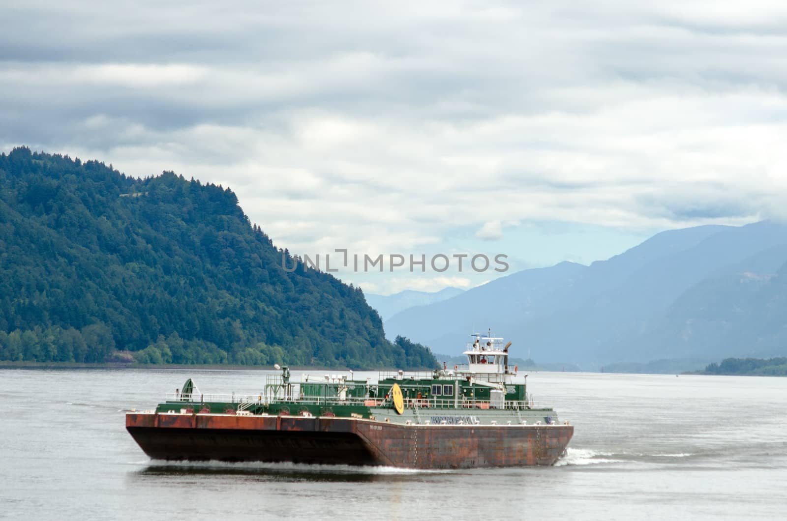 A Barge moving through the Columbia River Gorge