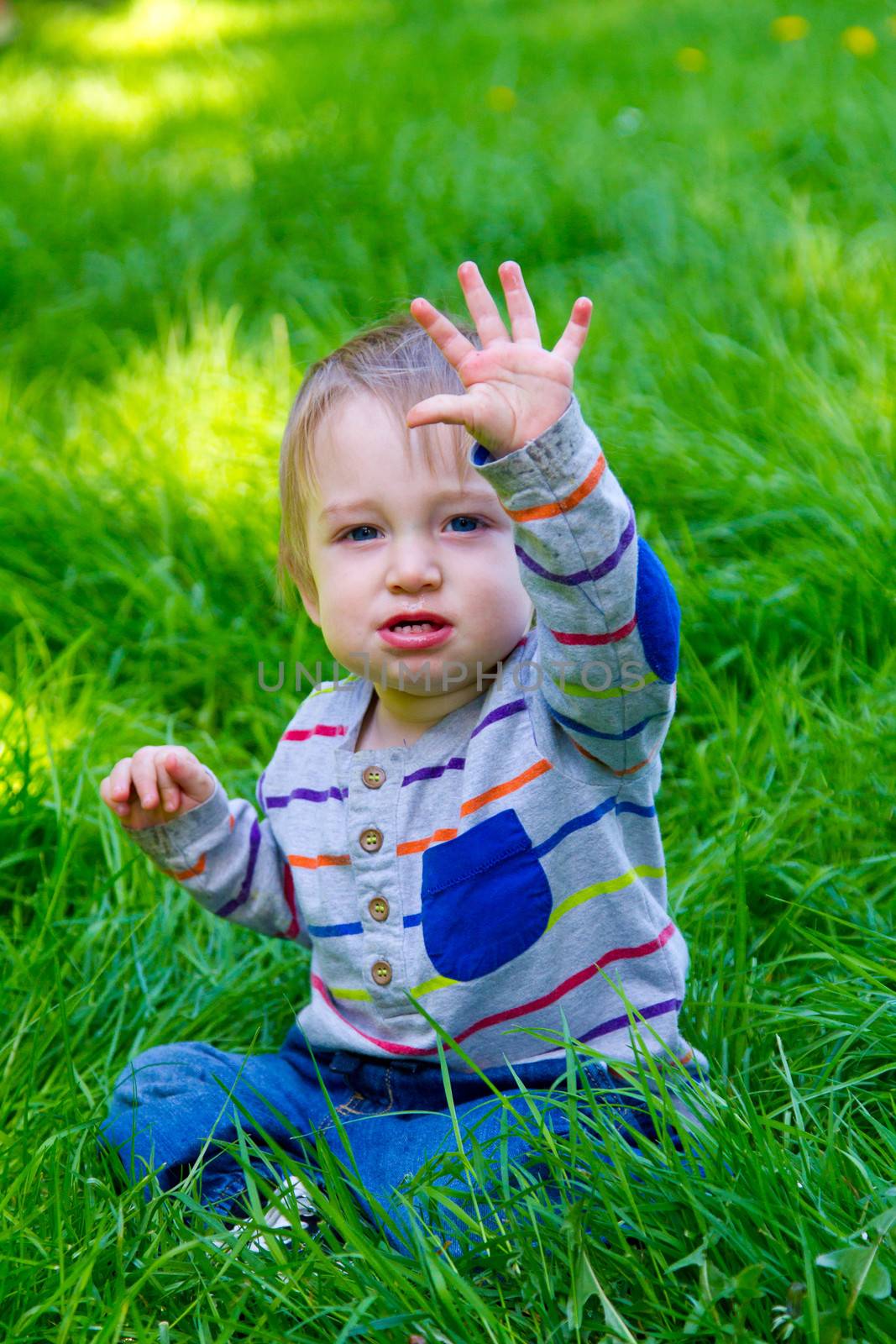 Boy Playing in Grass by joshuaraineyphotography