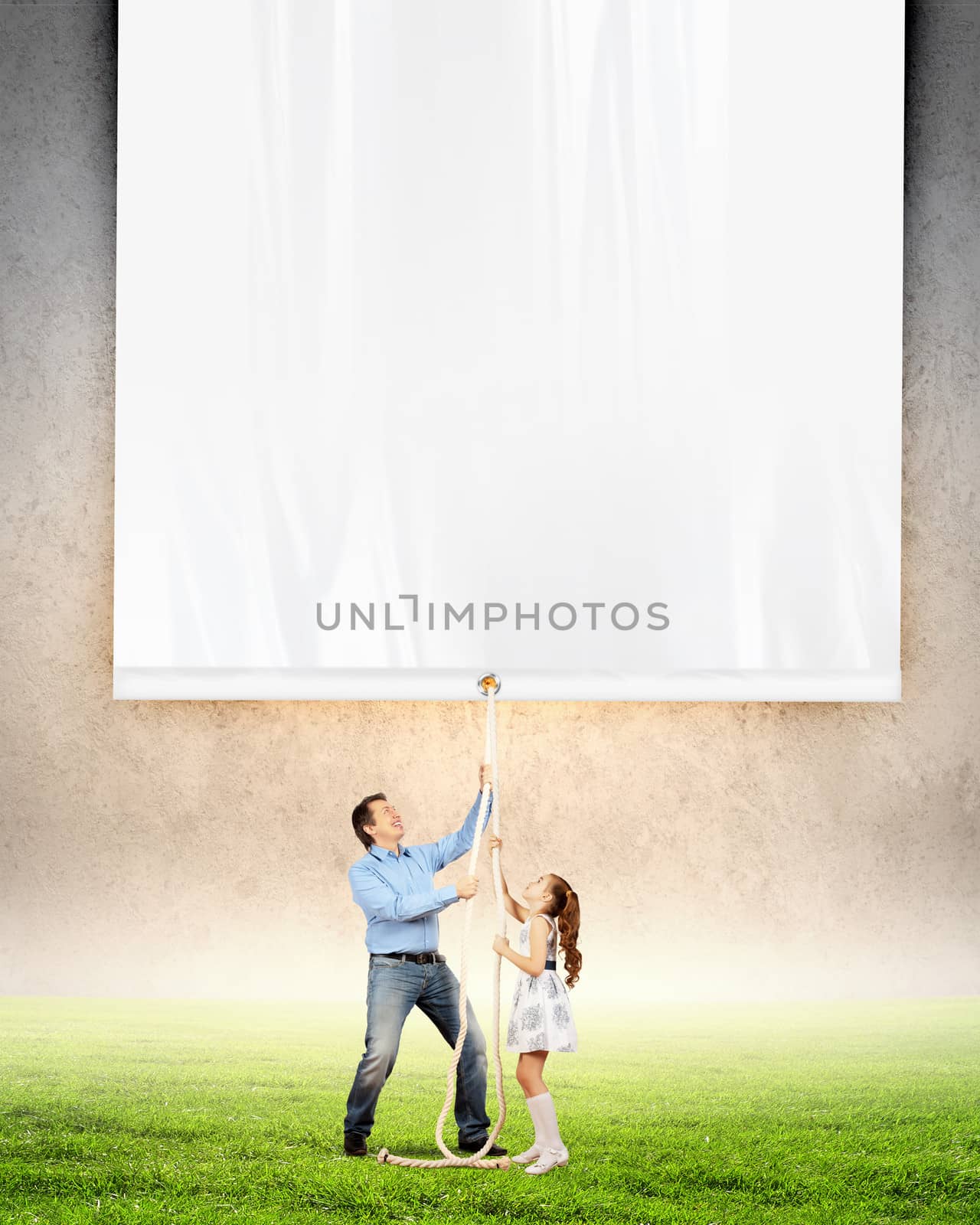 Man and little girl pulling banner by sergey_nivens