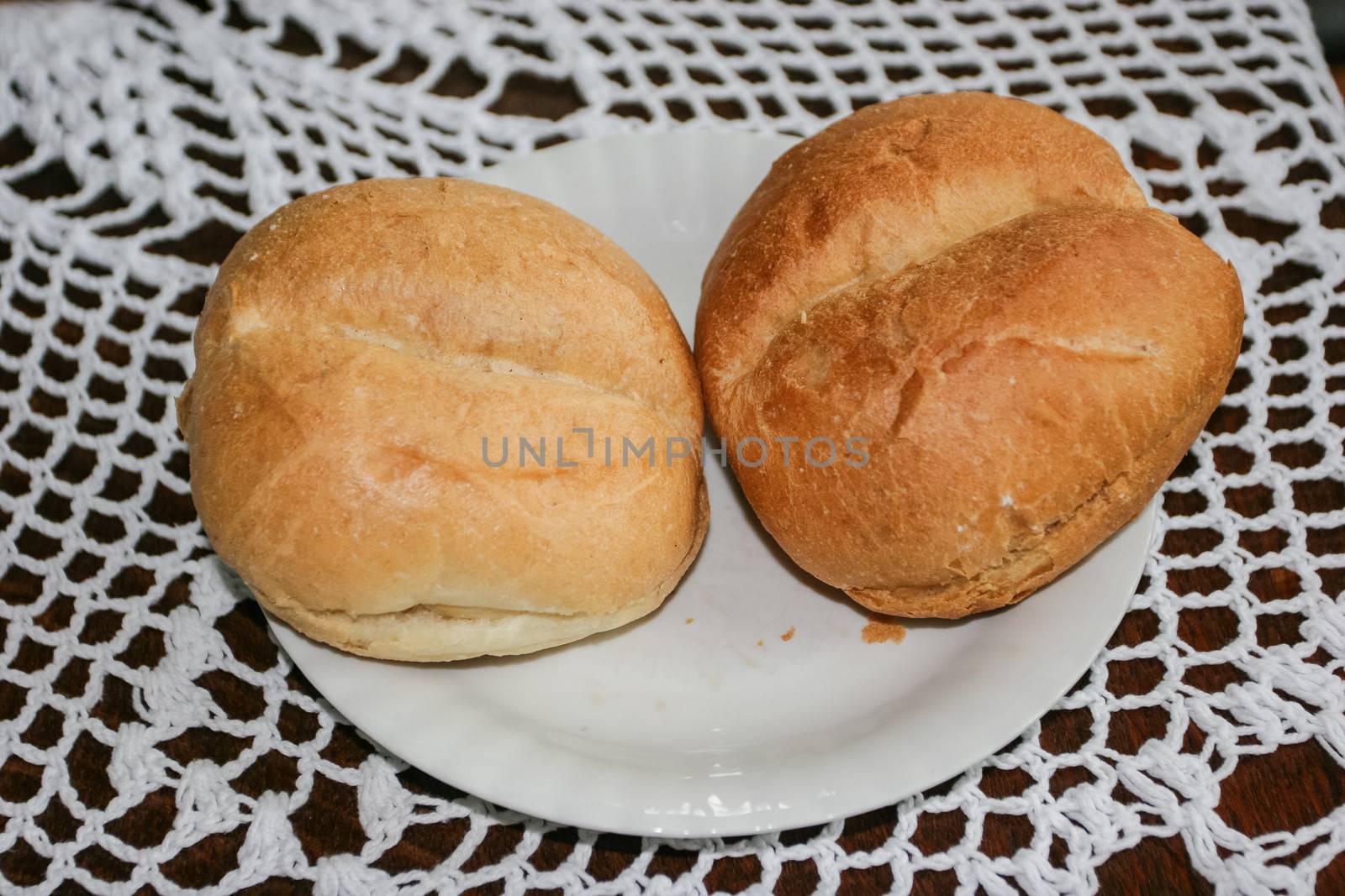 Crusty round roll made from wheat flour, barm, malt, water and salt