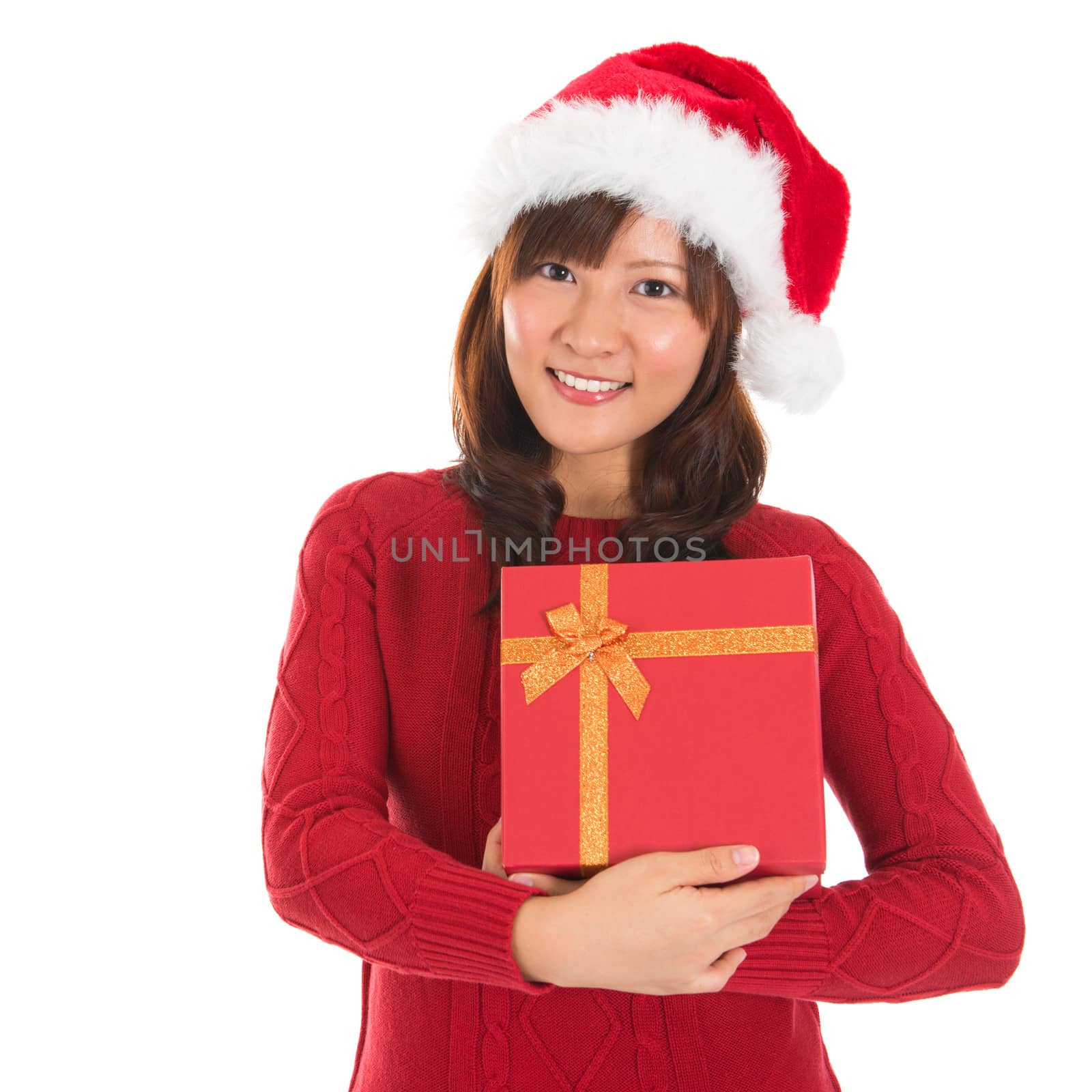 Asian Christmas Girl Holding Gift Box and Smiling, cute Asian beauty model, isolated on white background