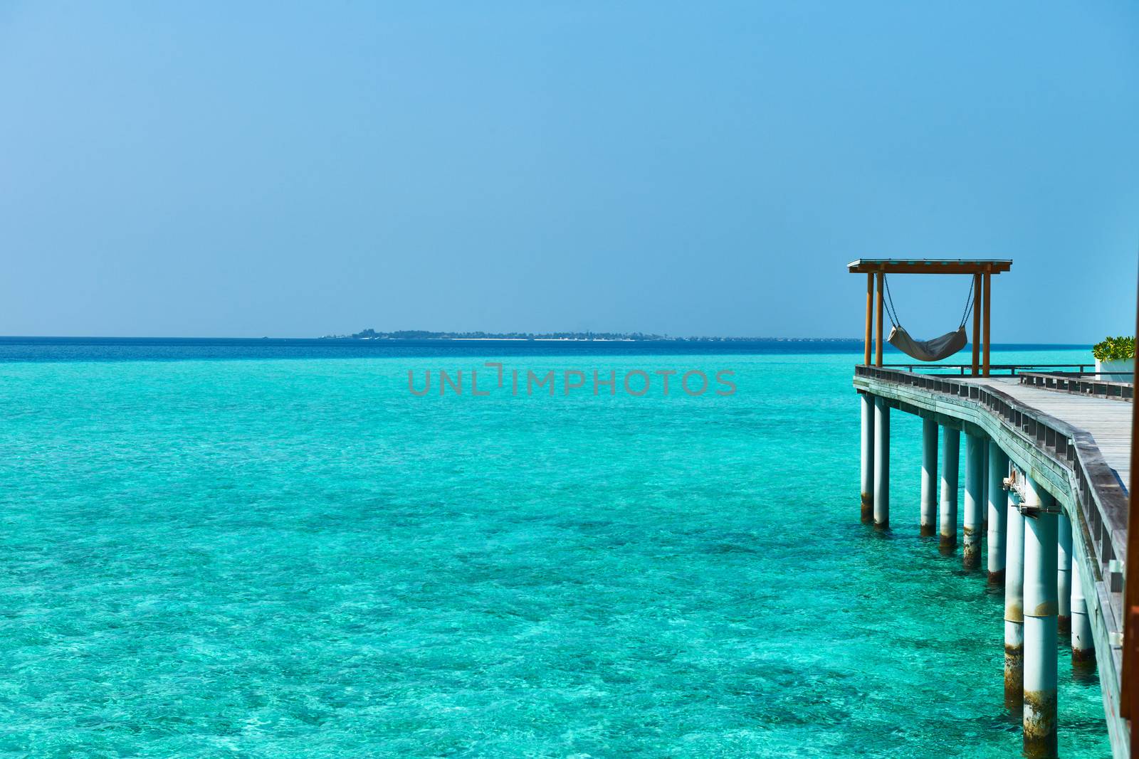 Beautiful beach with water bungalows at Maldives