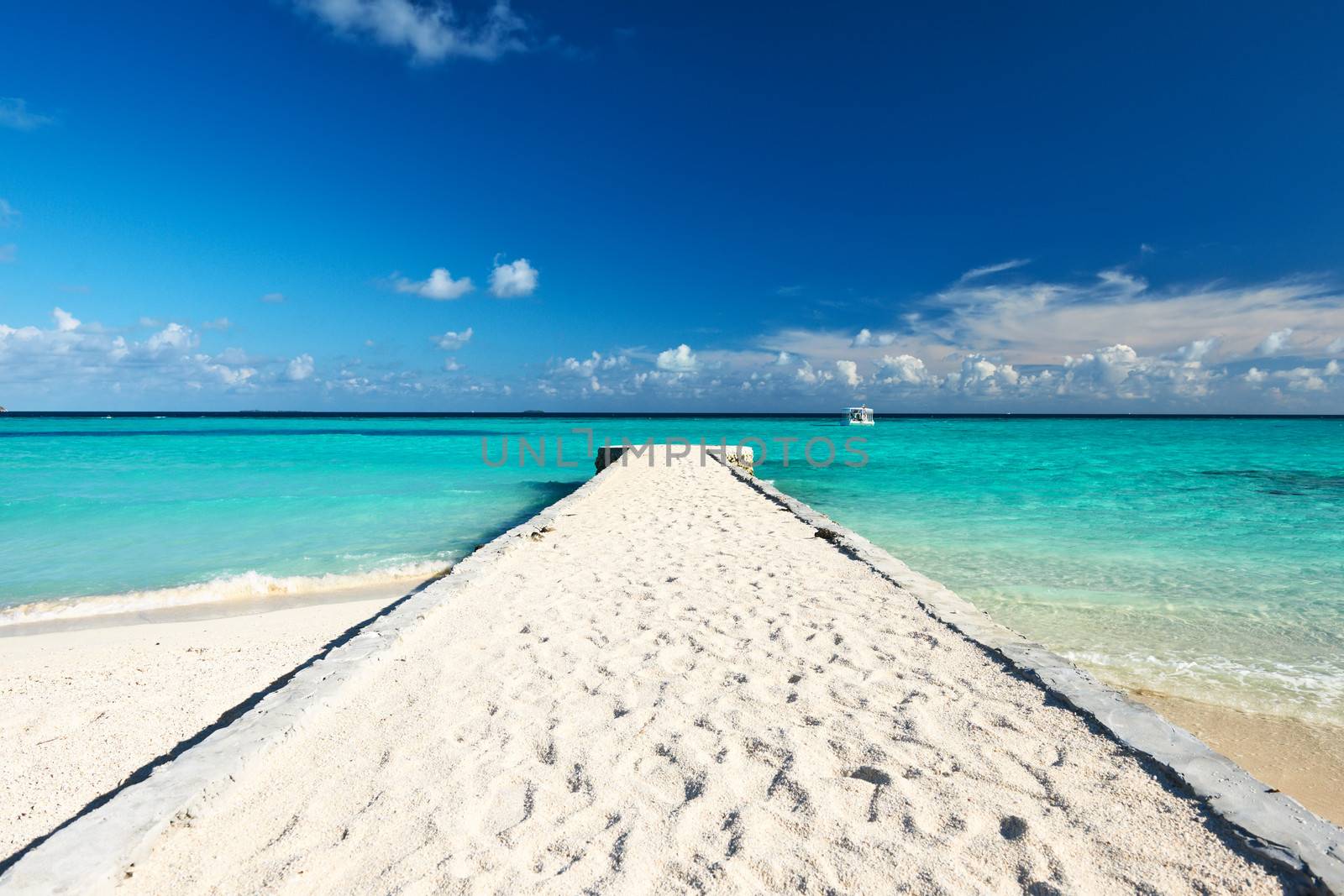 Beautiful beach with jetty at Maldives