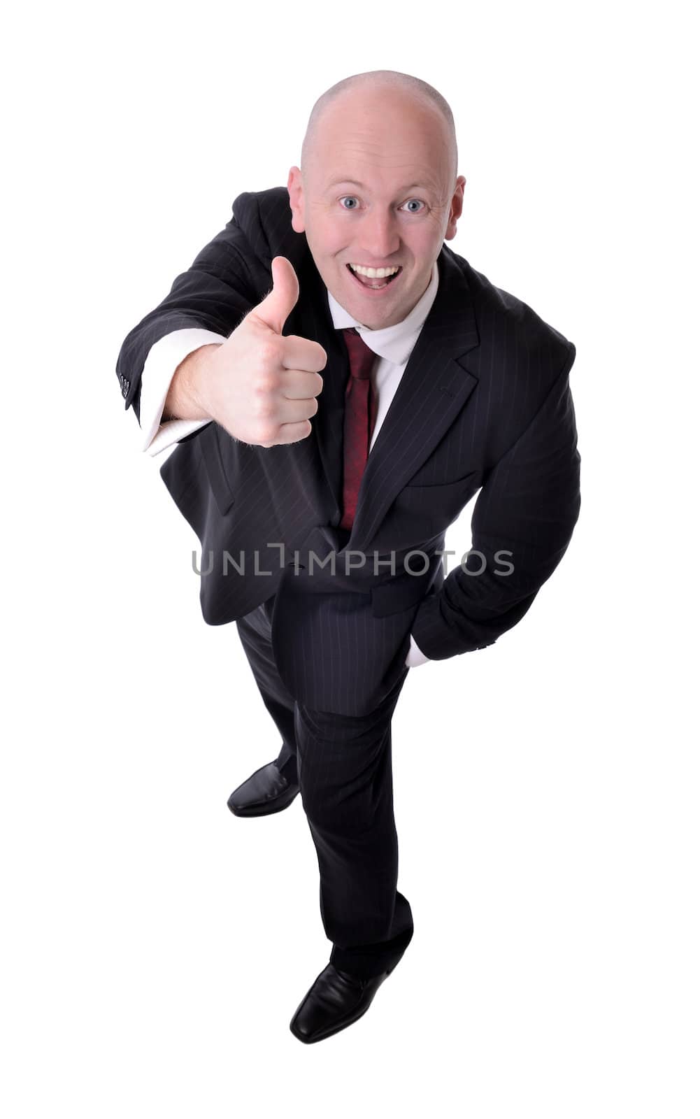 thumbs up from a businessman viewd from above