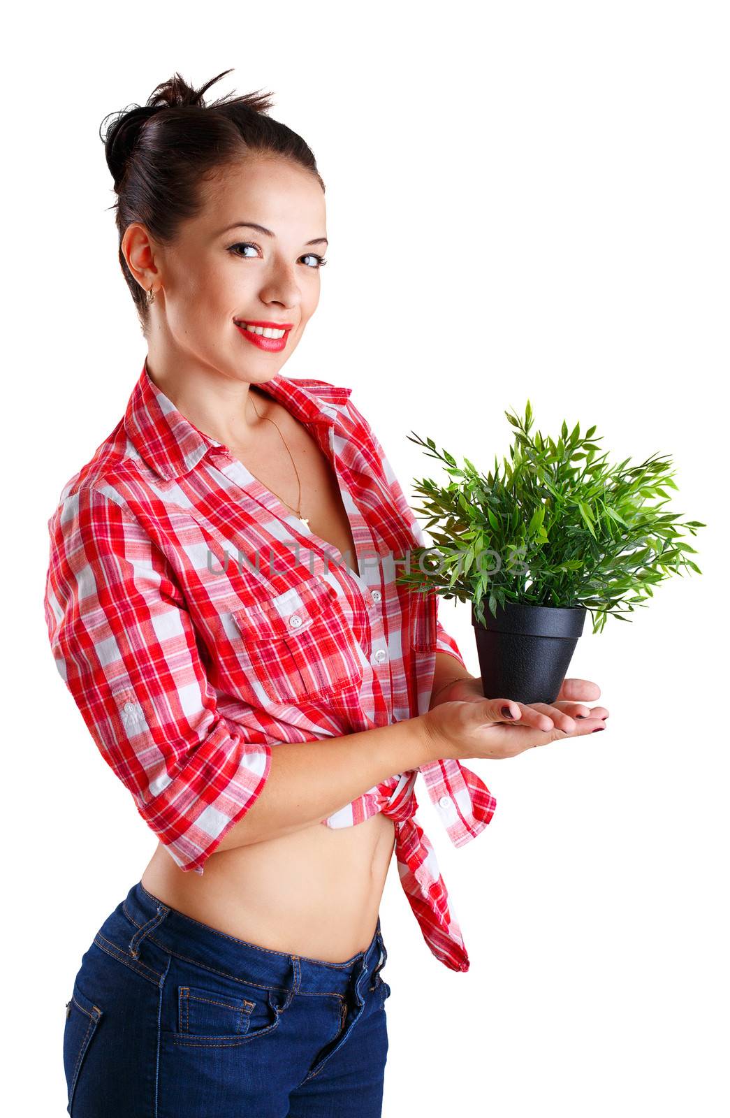 Girl holding a plant in a pot isolated on white background