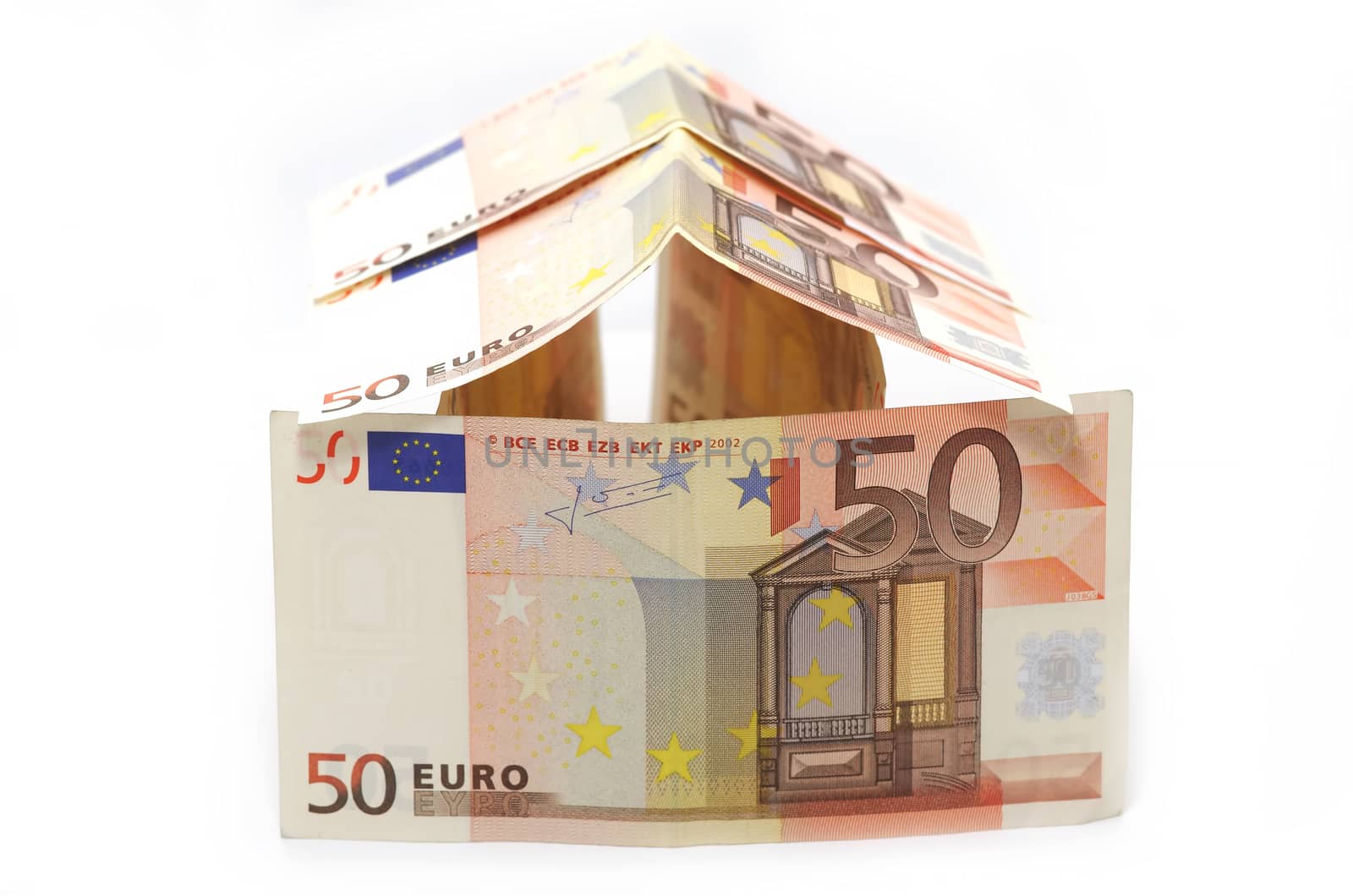 Money (euro) house on a white background