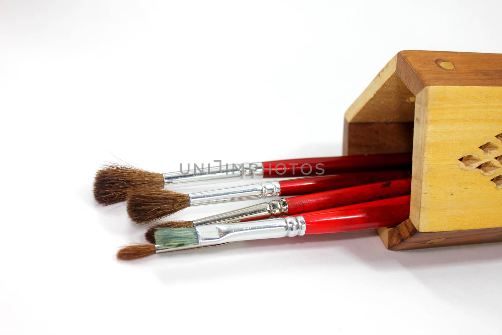 paint brush with wooden stand on white background