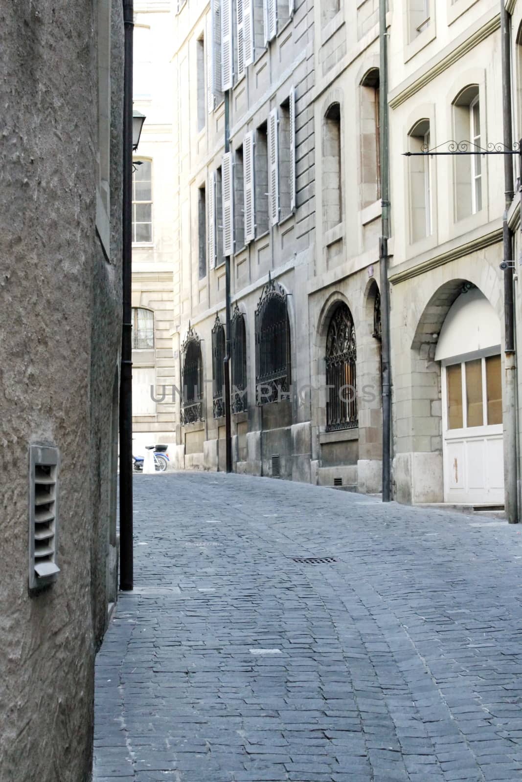 Street with stones in old city of Geneva, Switzerland