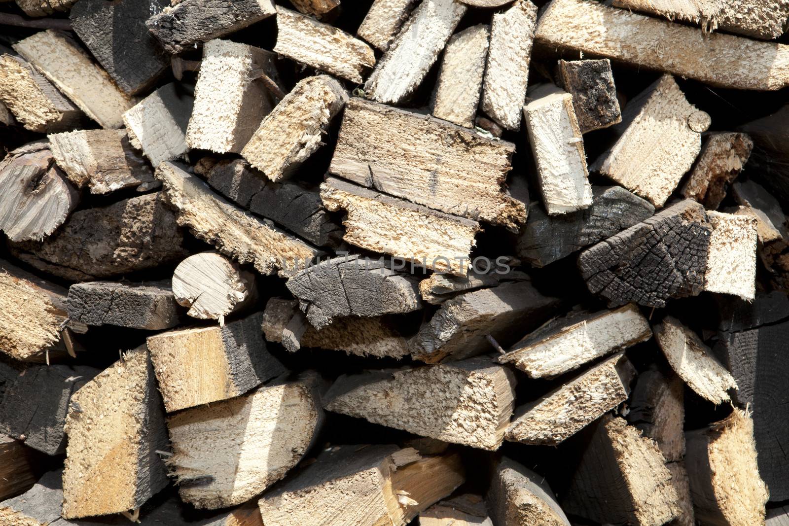 Stack of beech chopped firewoods prepared for firing