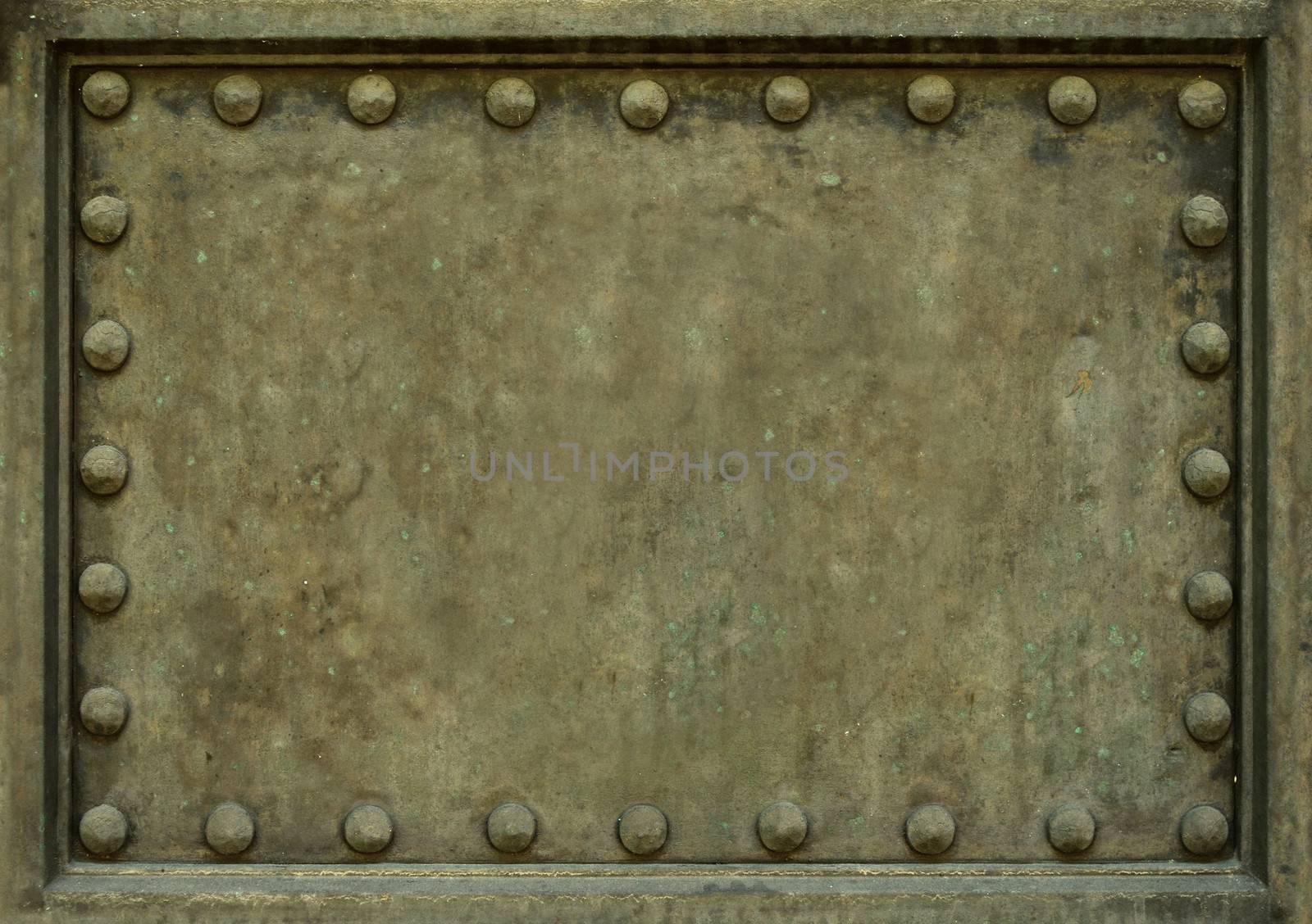 Background Texture Of Heavy Protective Metal Plate With Rivets