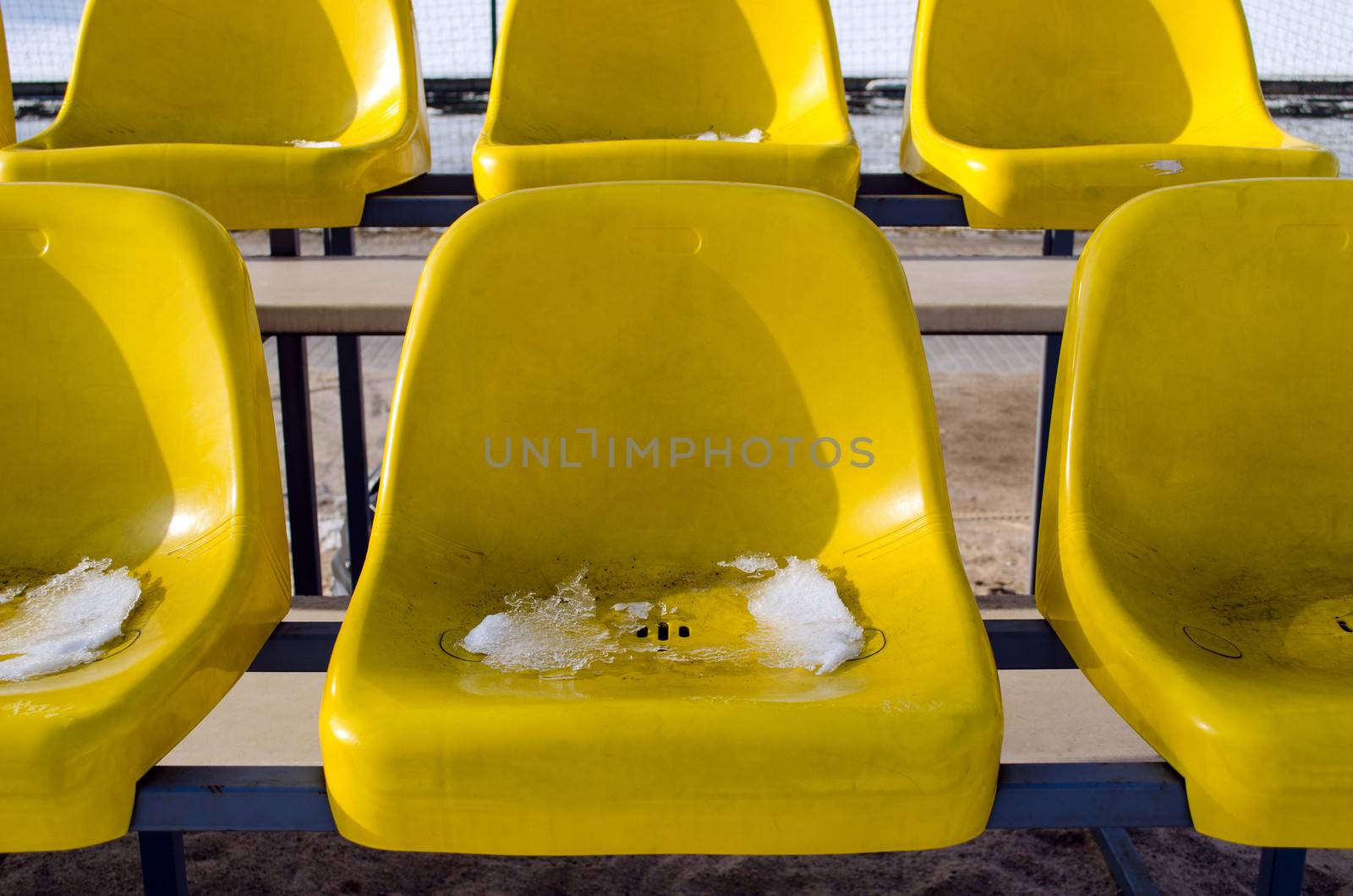 beach volleyball yellow chairs in winter