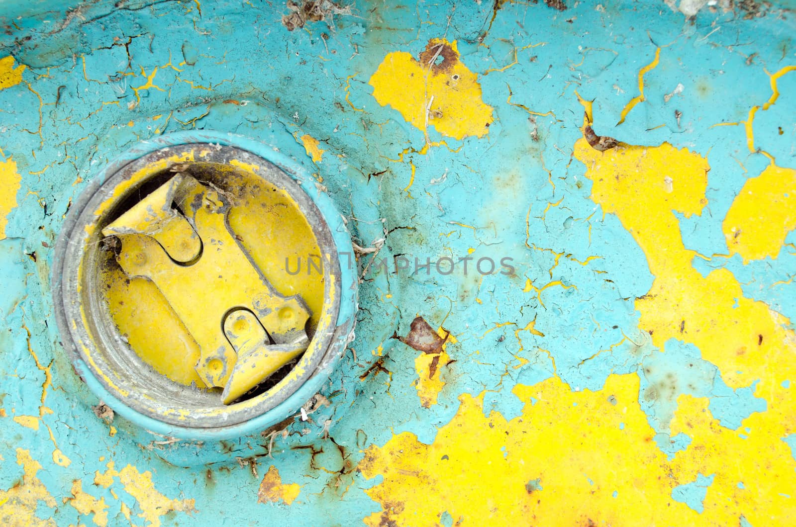 closed retro peeled paint toxic steel barrel hole background.