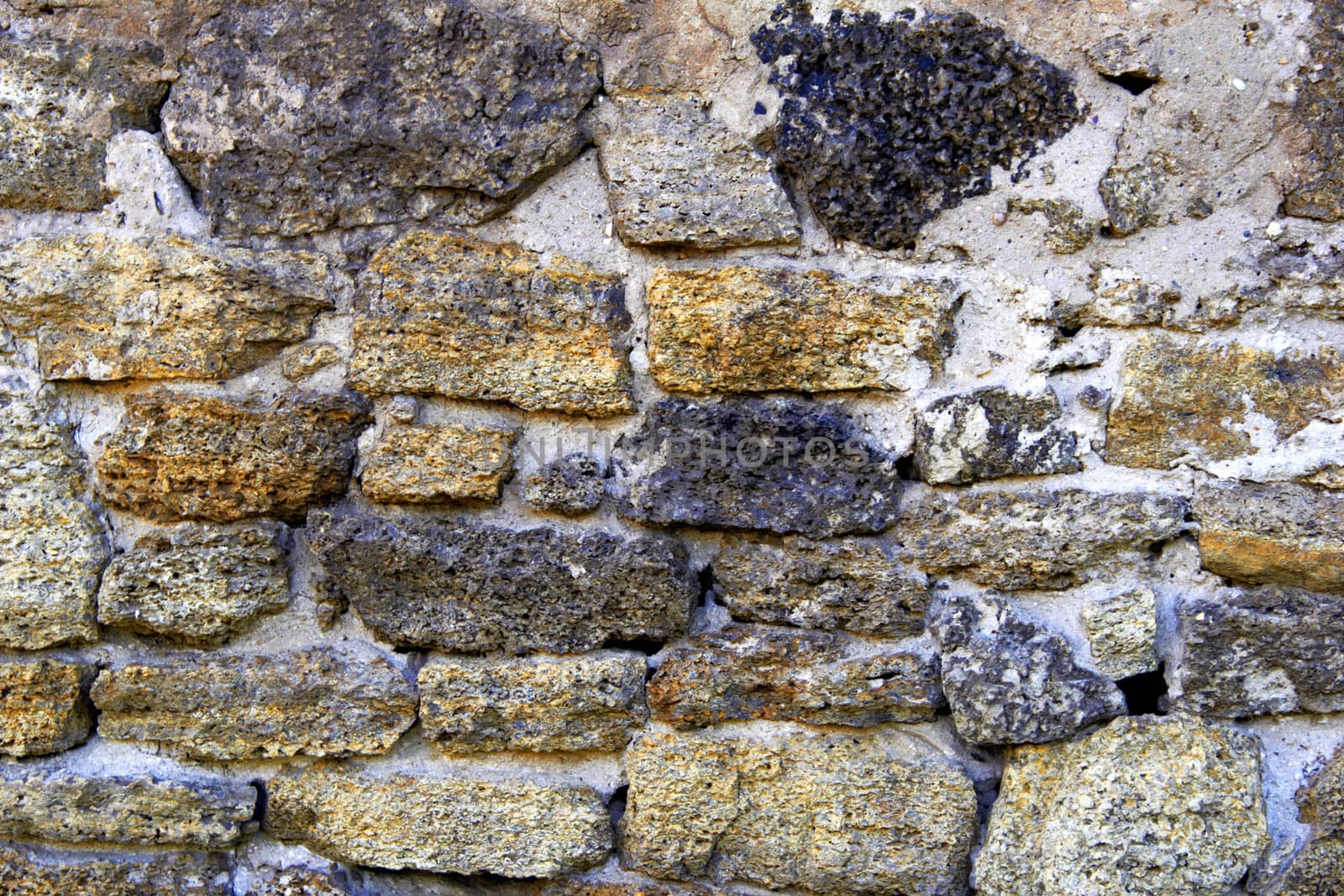 wall of a large rough stone