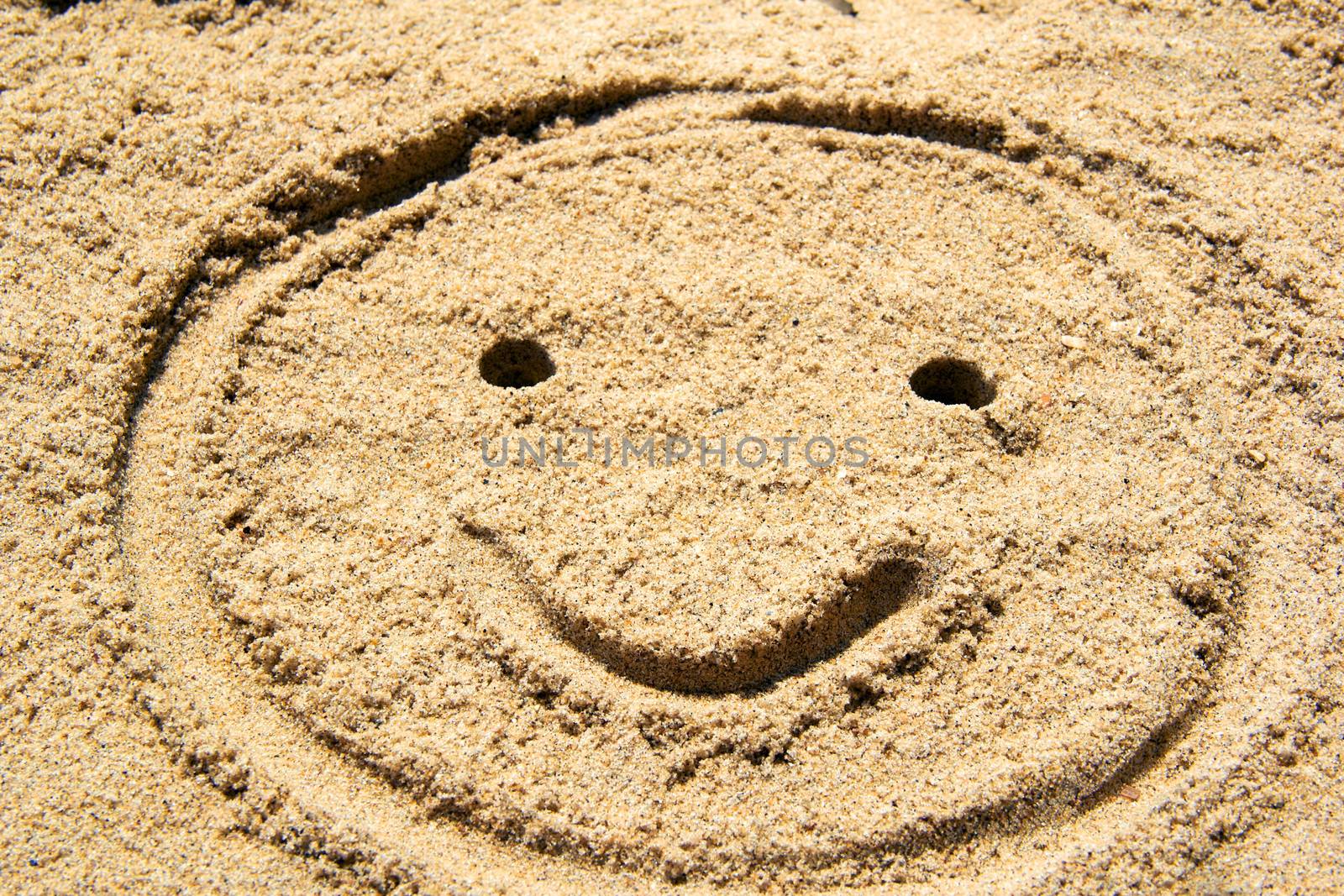 fun sand drawing smile face