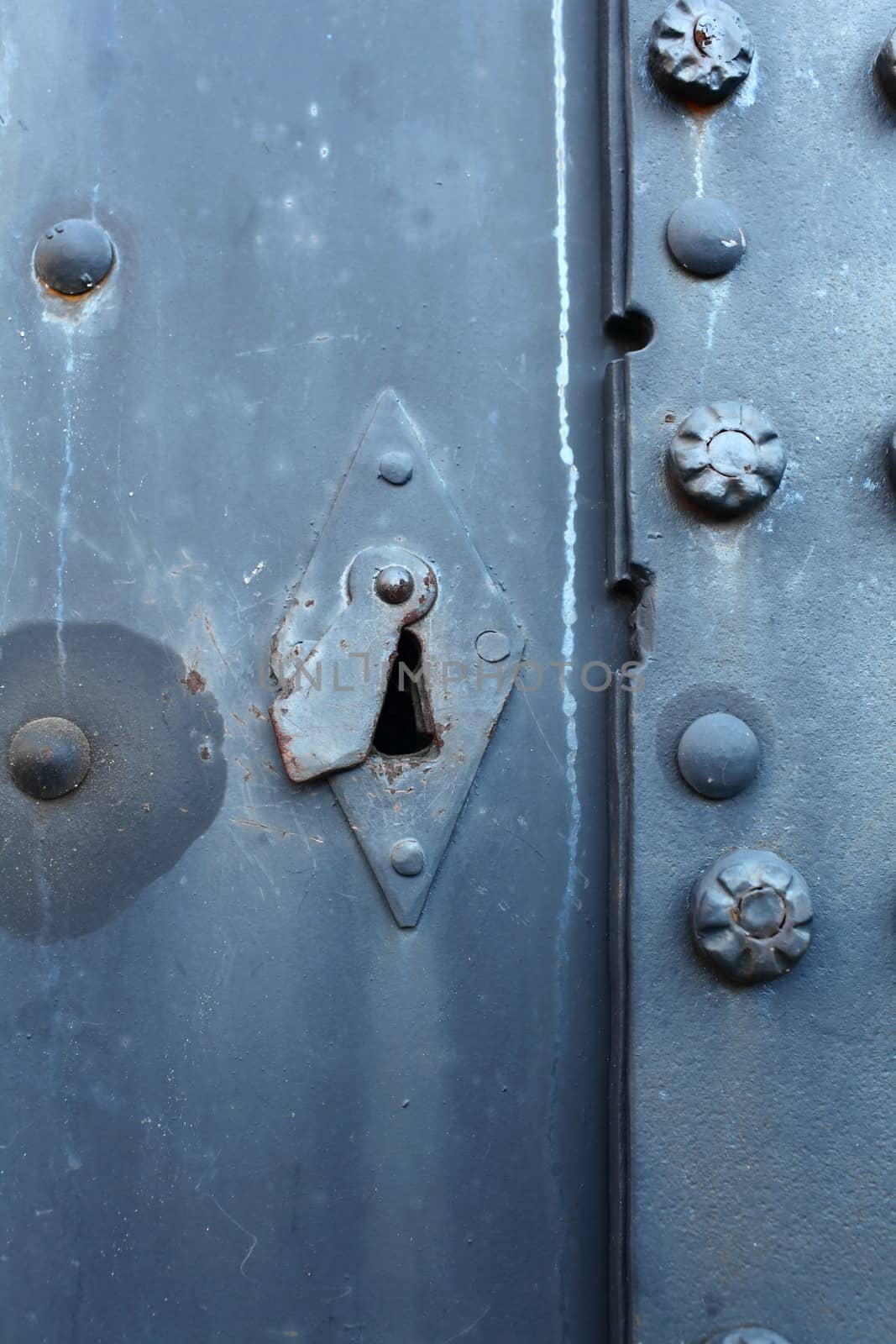 The Old steel door, keyhole closes