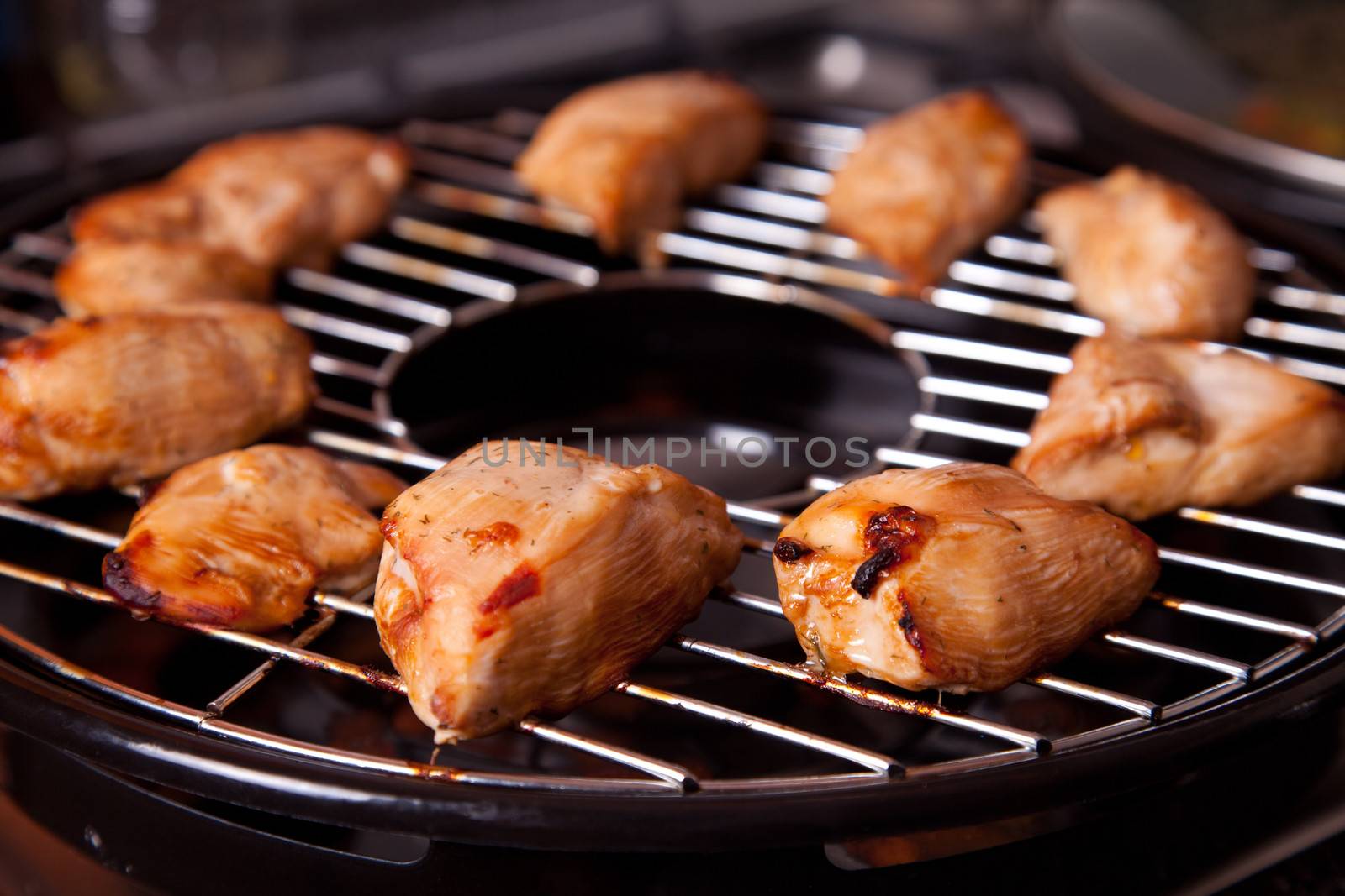 Delicious grilled chicken on gas grill 