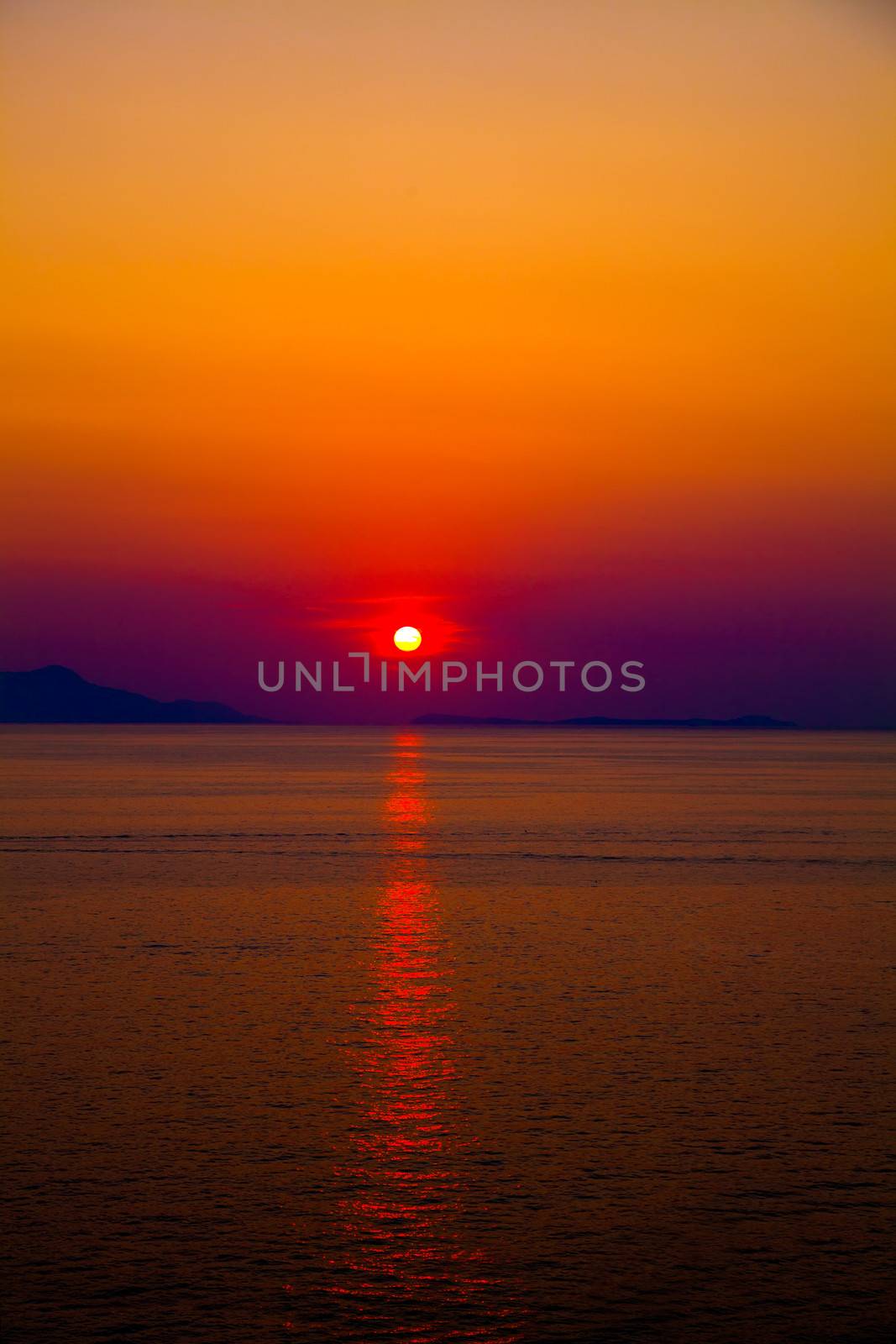 Scenic view of beautiful sunset above the sea by motorolka