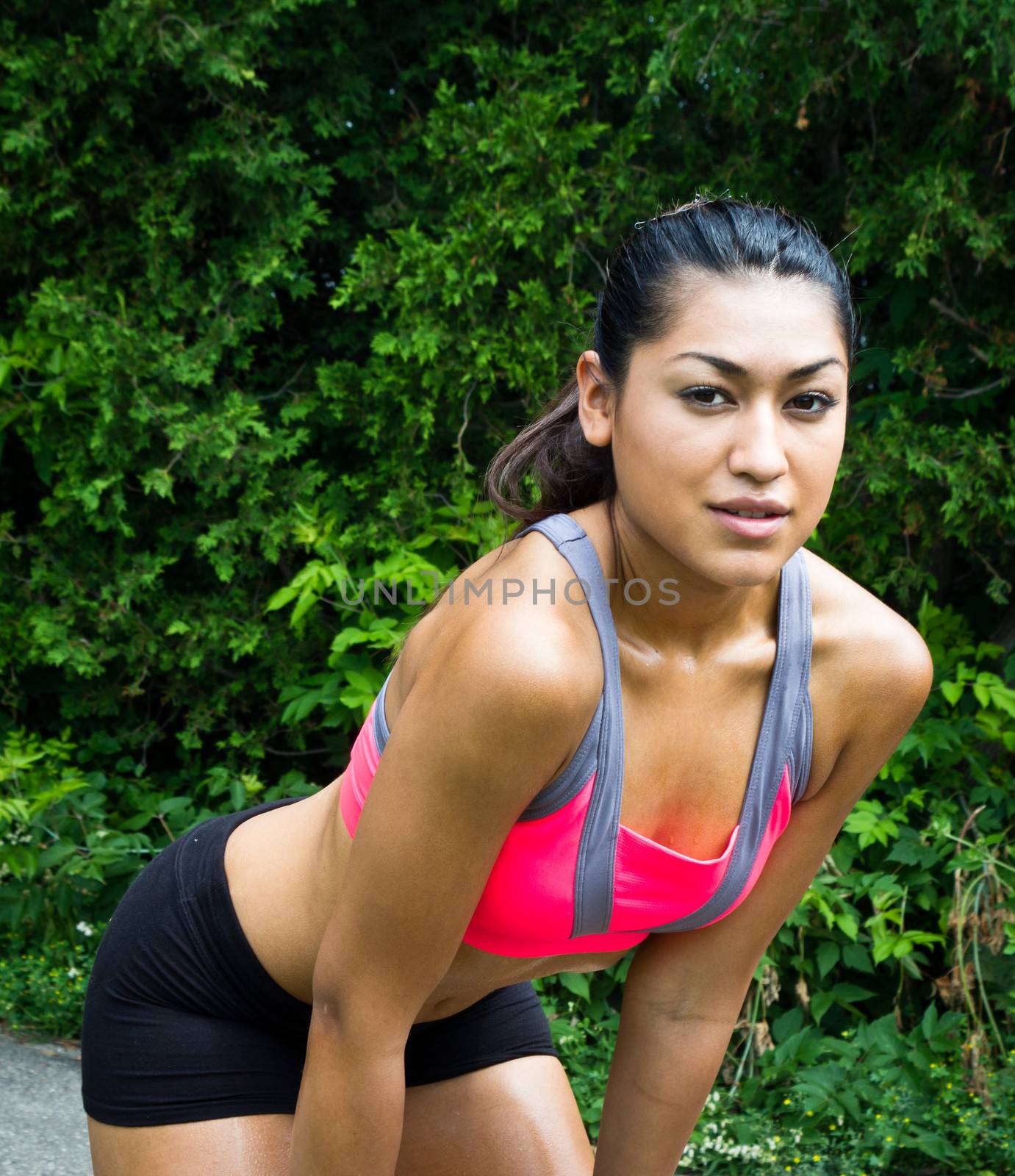 Young woman resting after running by bigjohn36