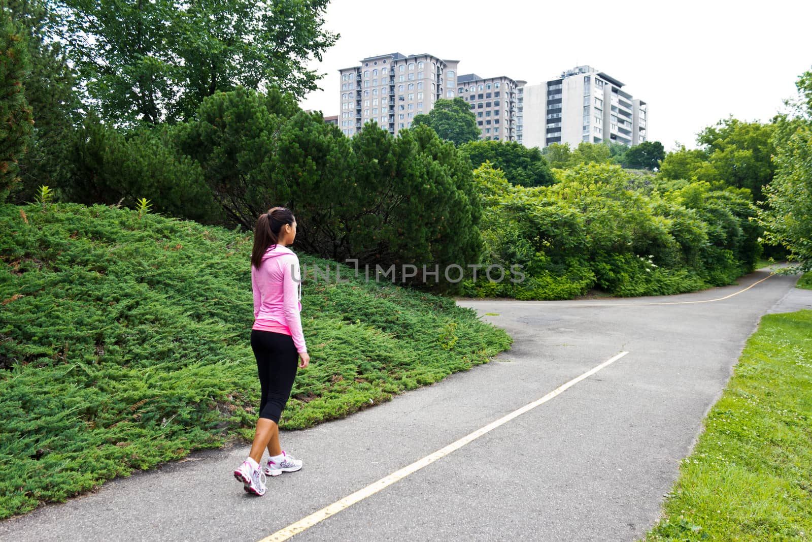 Woman walking on the jogging path