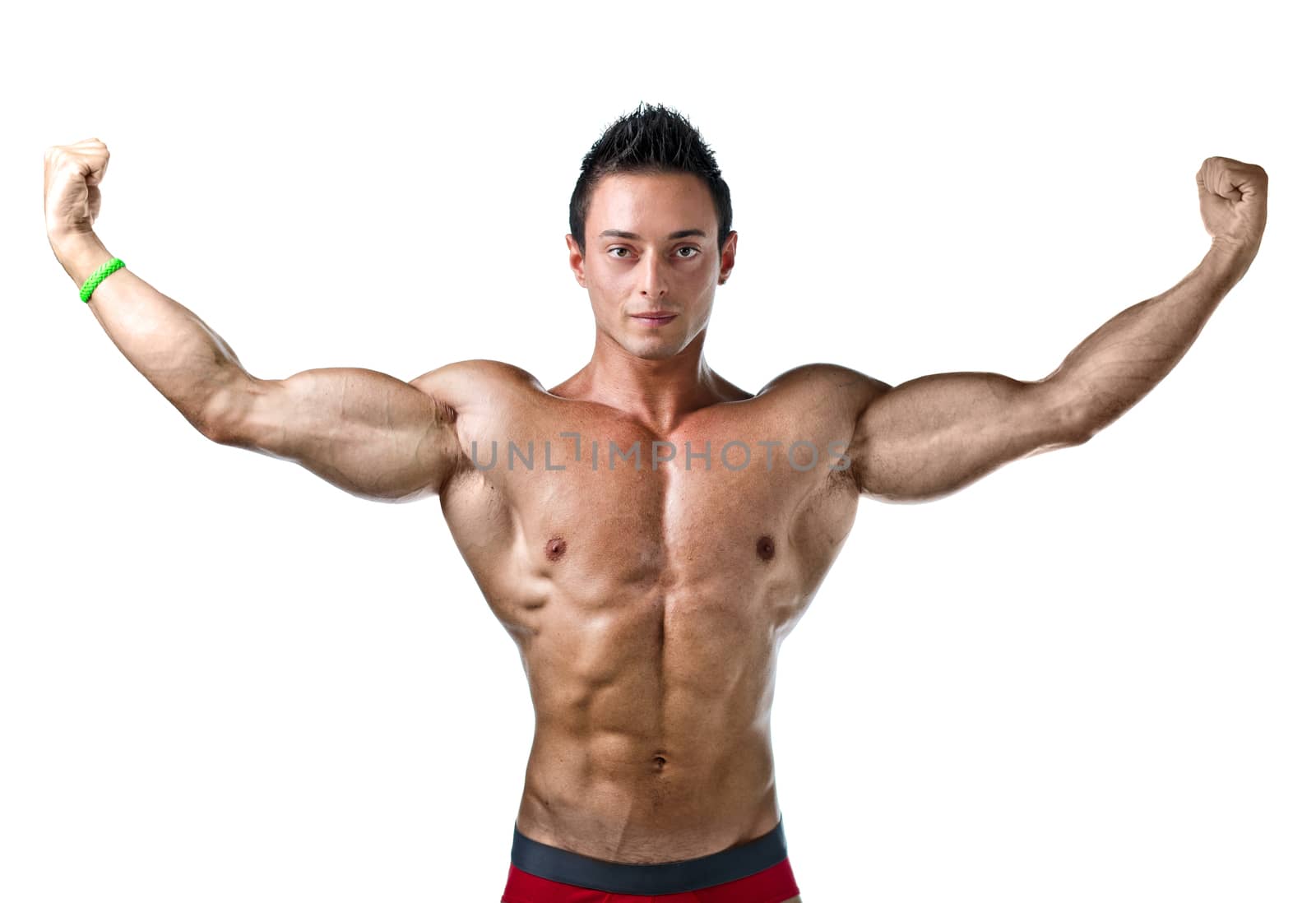 Attractive young muscle man shirtless with arms spread open, isolated on white