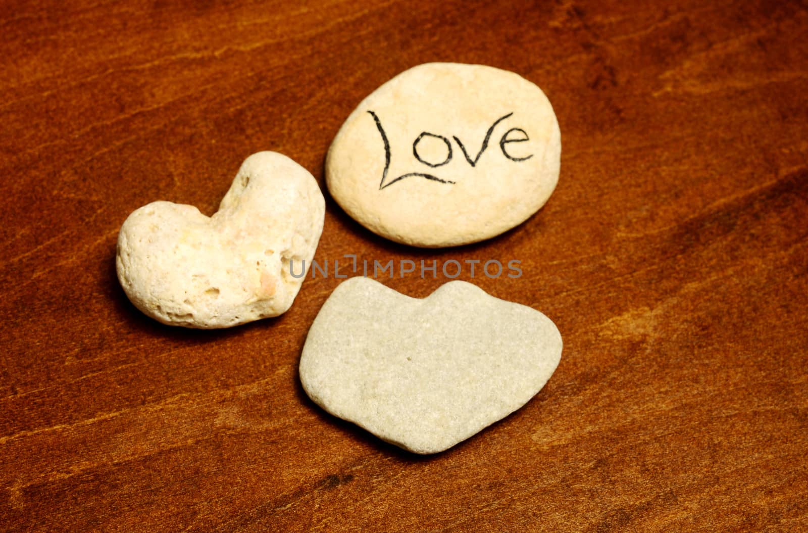 rocks shaped like hearts with word love for peaceful scene