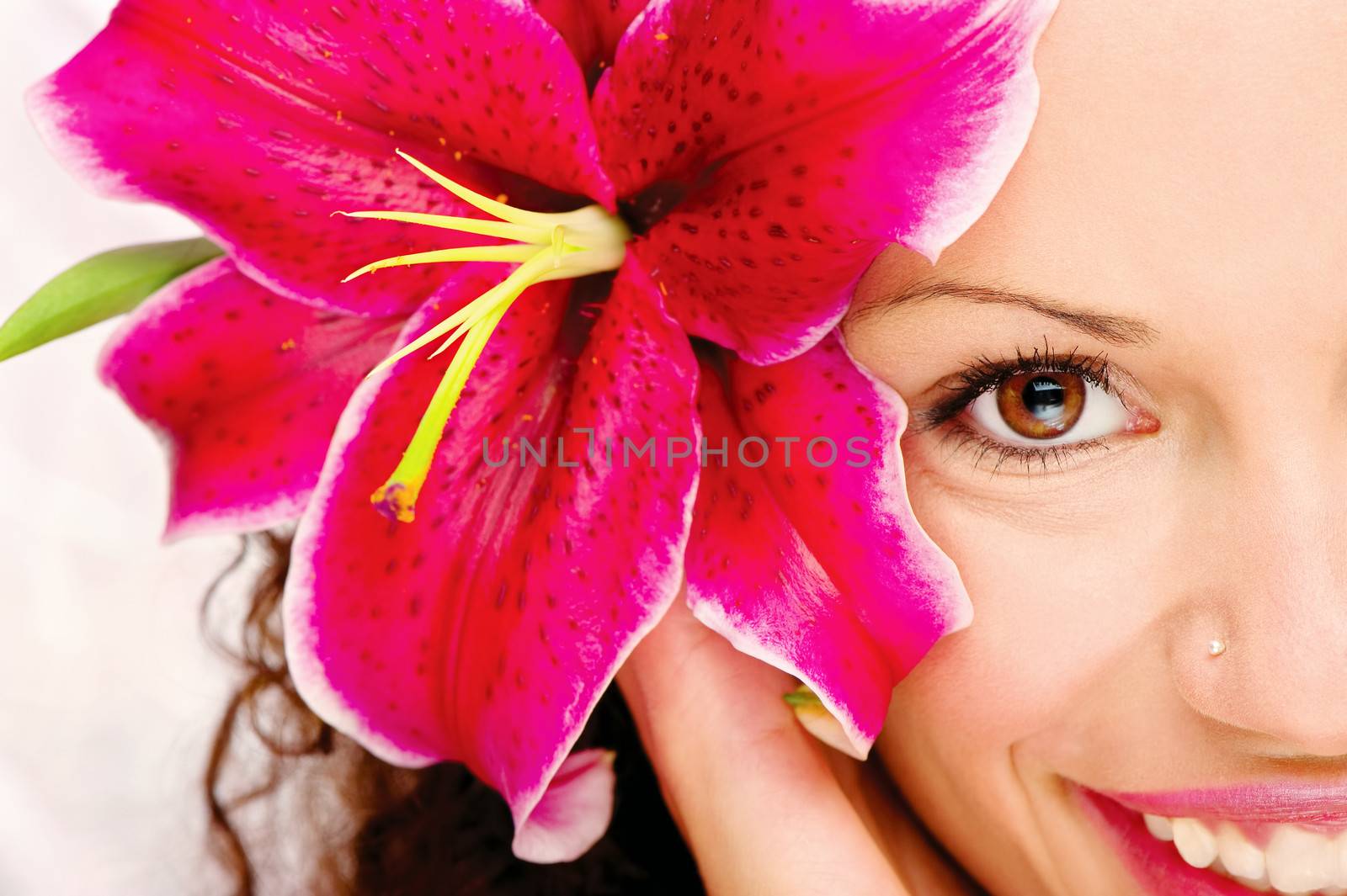 Big flower in woman's hair by imarin