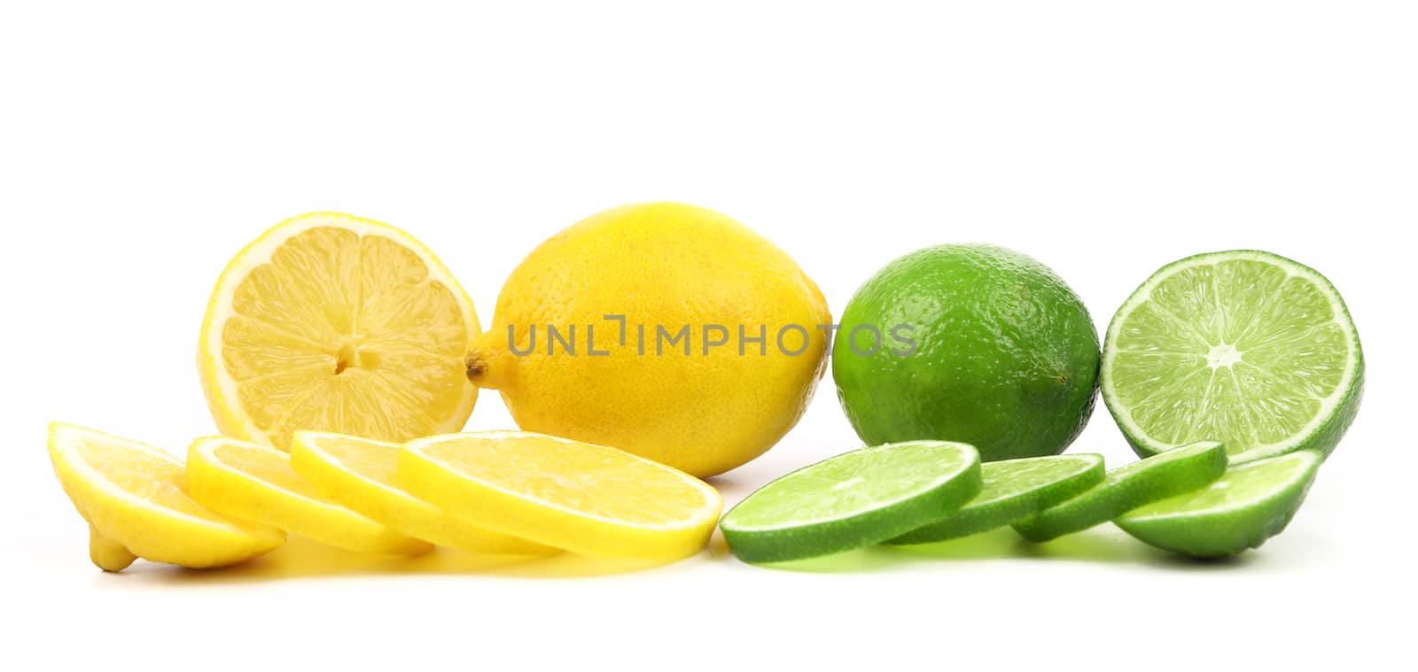 Fresh limes and lemons. Slices. by indigolotos
