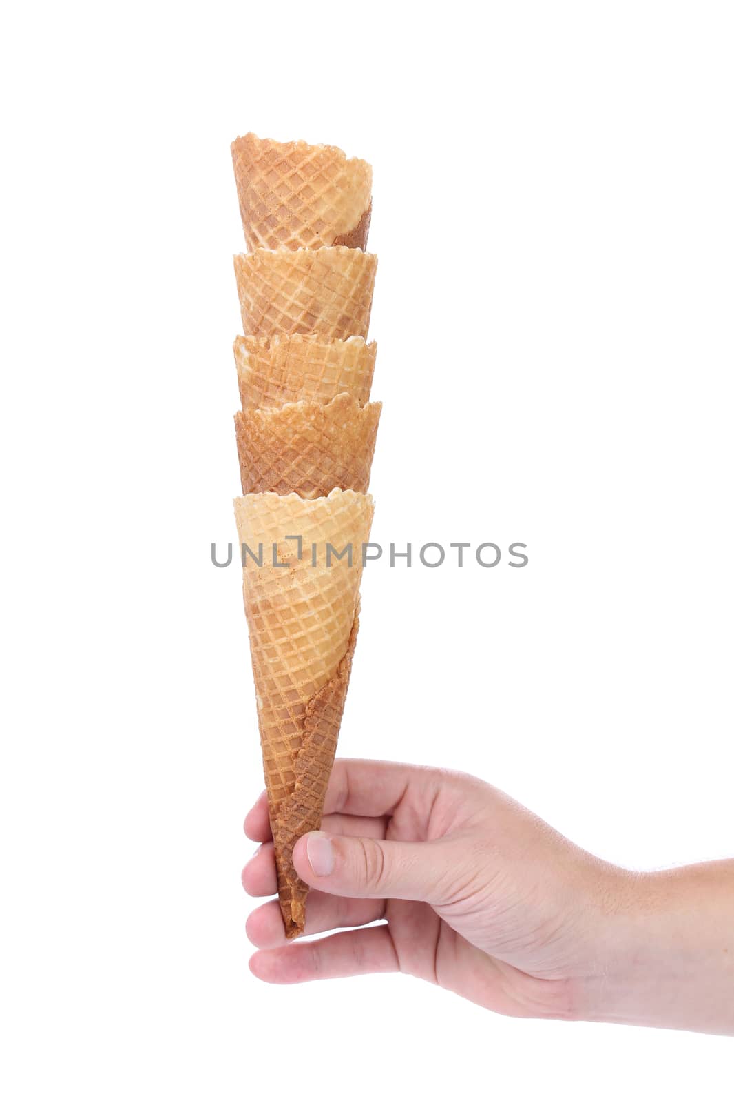 Hand hold stake of wafer cup for ice-cream. White backgroud.