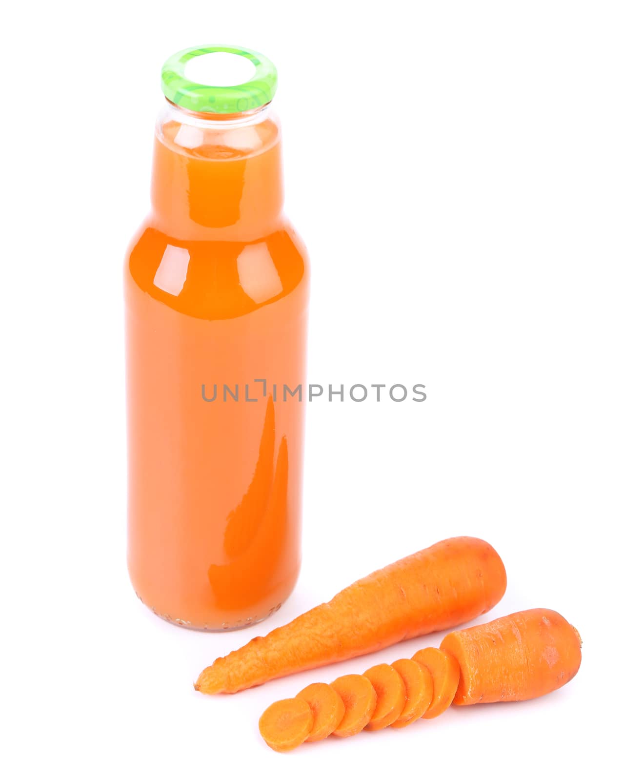 Slices raw carrot and juice. Close up. White background.