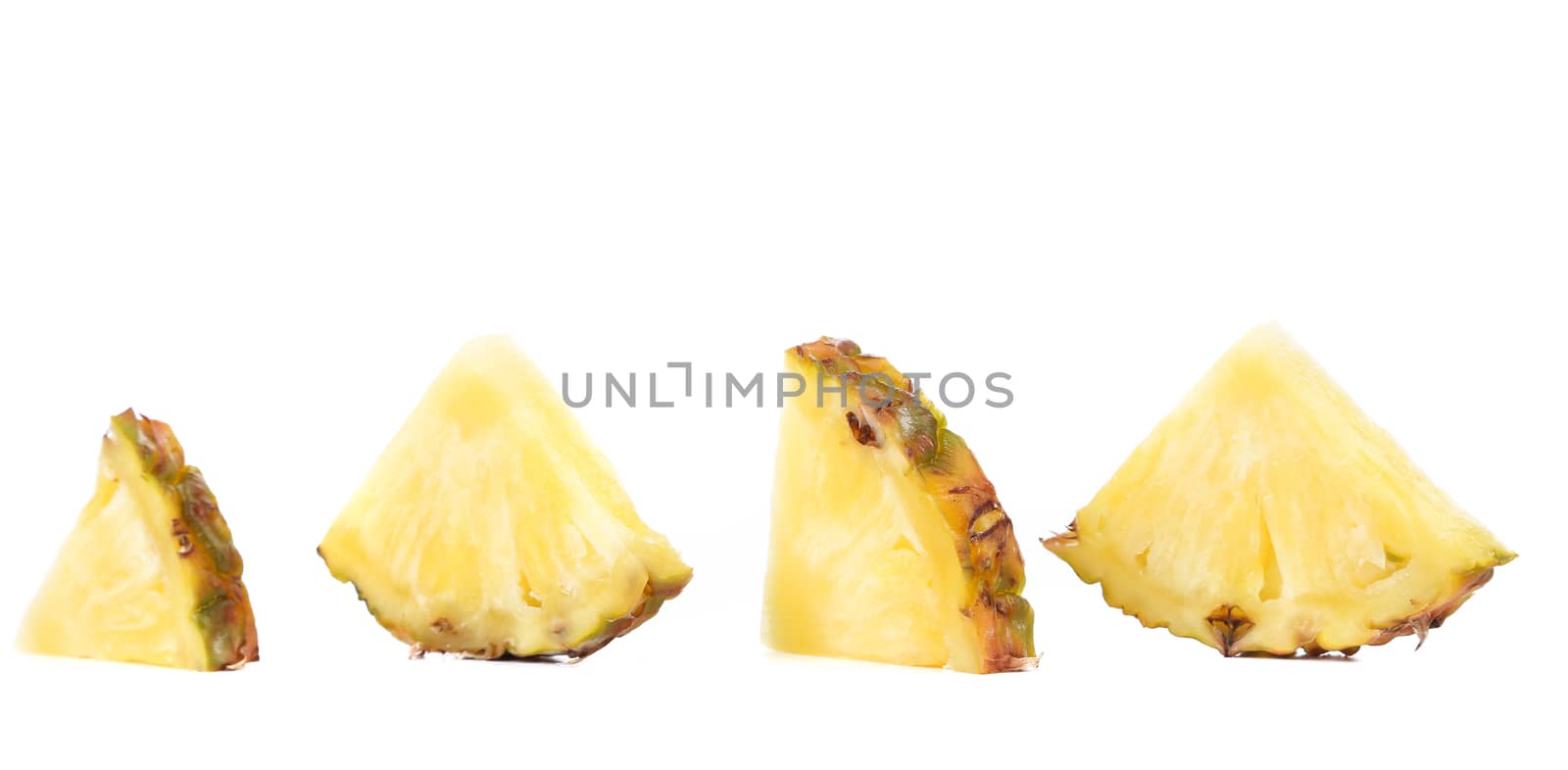 Quarters of slices pineapple. by indigolotos