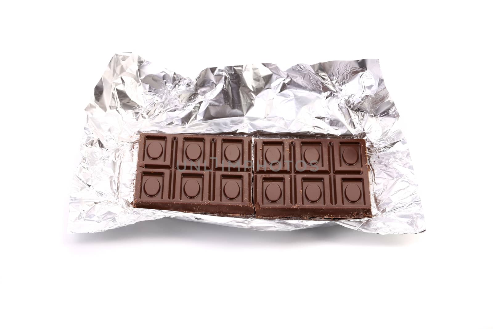 Unwrapped Chocolate Bar. Close up. White background.