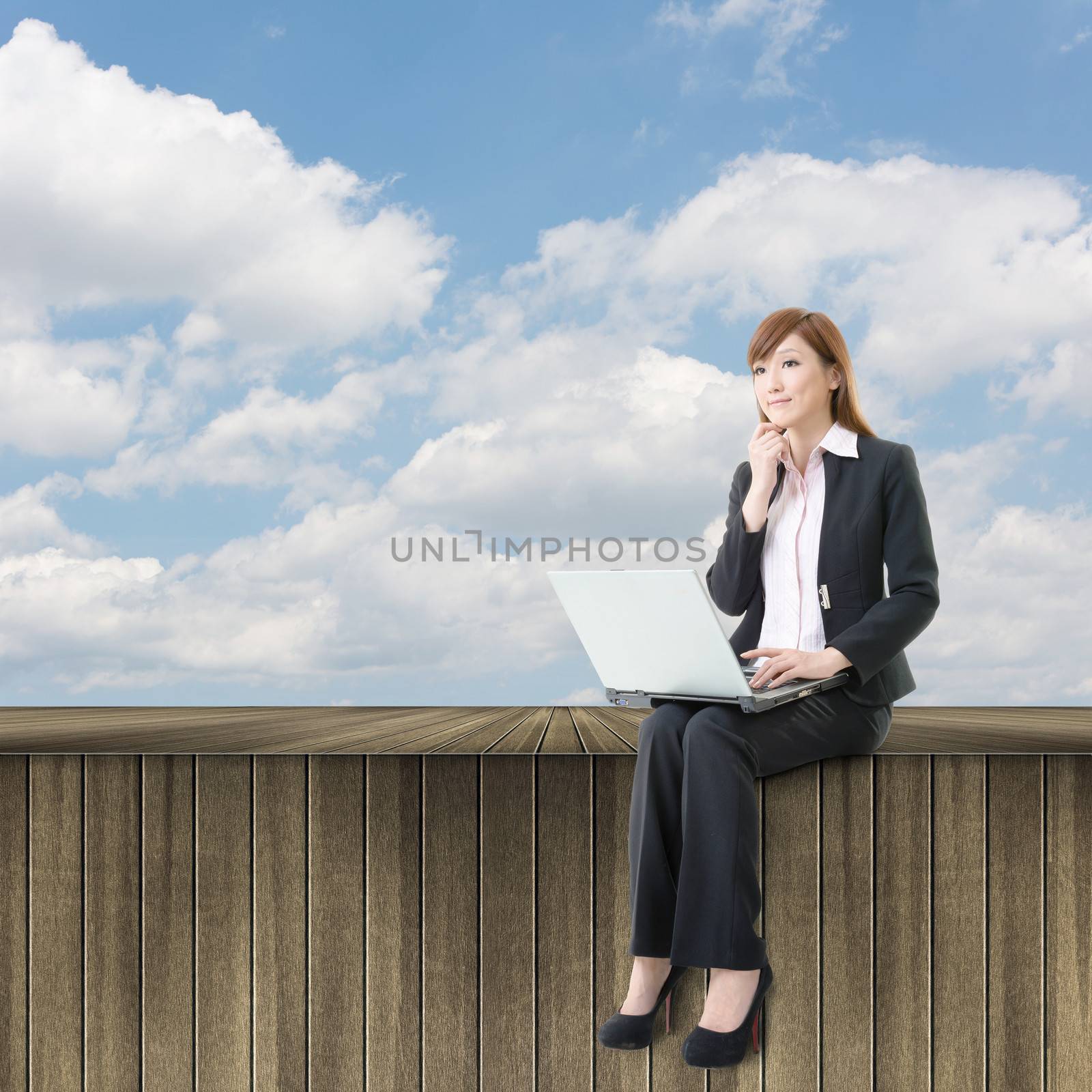 Asian business work outside under cloudy sky, concept of cloud, work, business with copyspace on heaven.