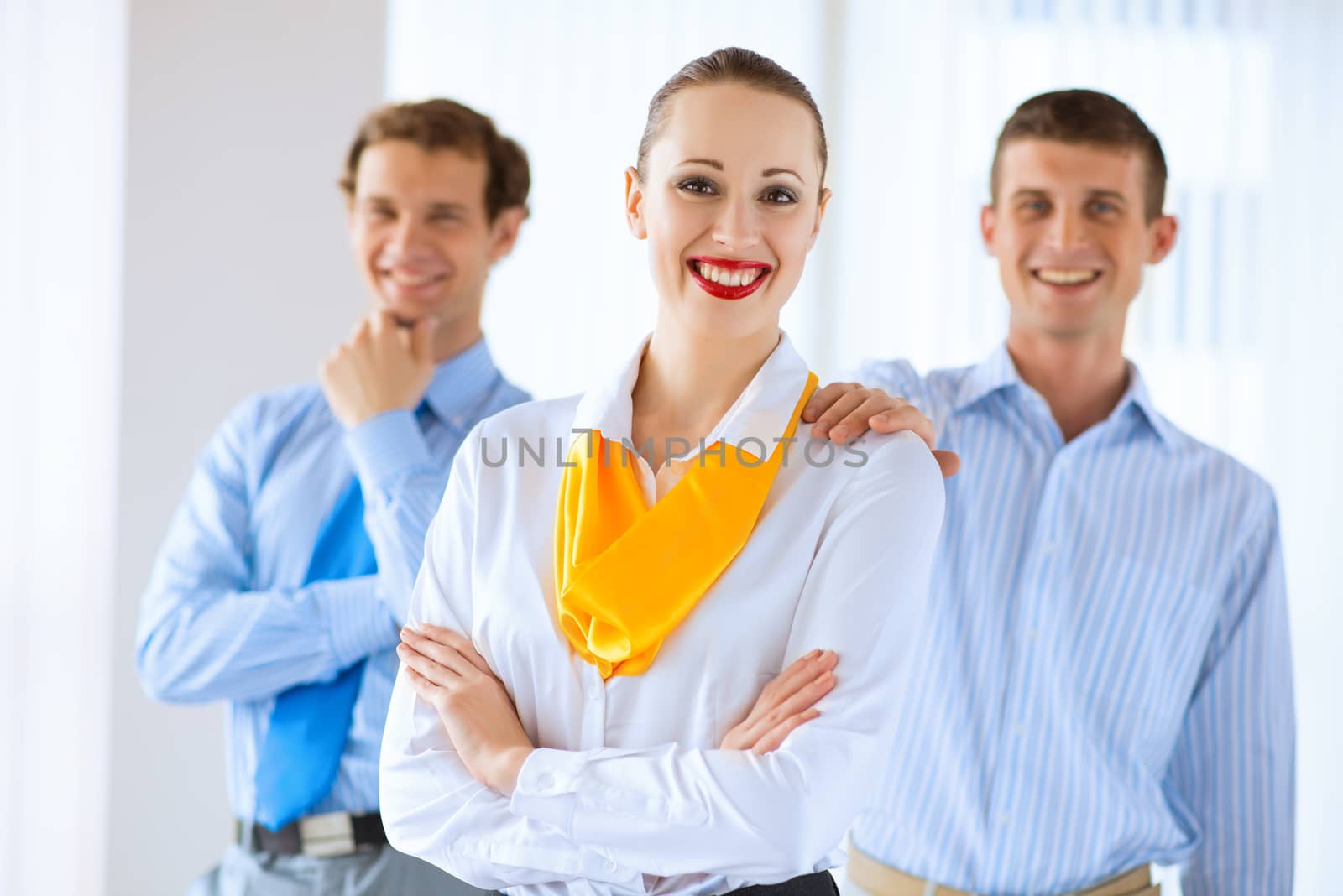 young successful business woman receiving congratulations from his colleagues