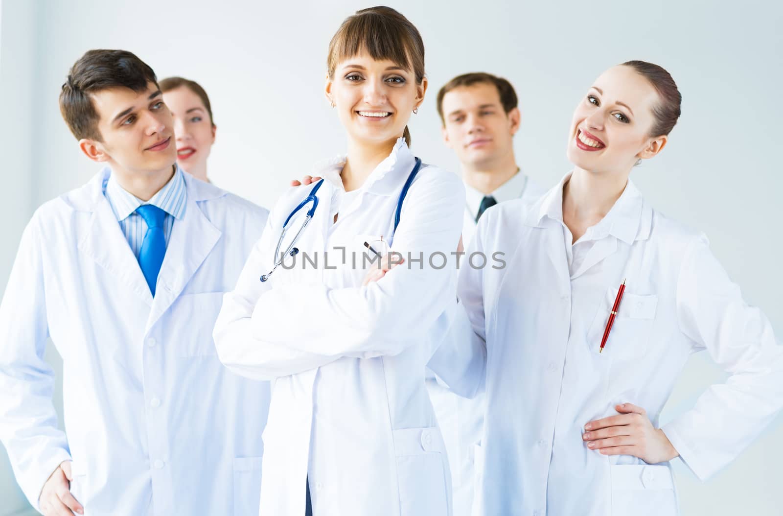 team of experienced highly qualified doctors, fold one's arms