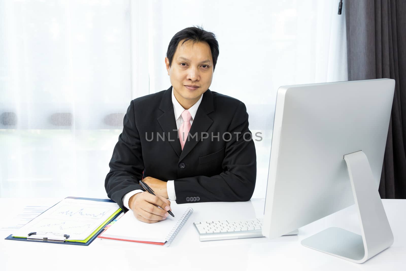 businessman working with desktop computer