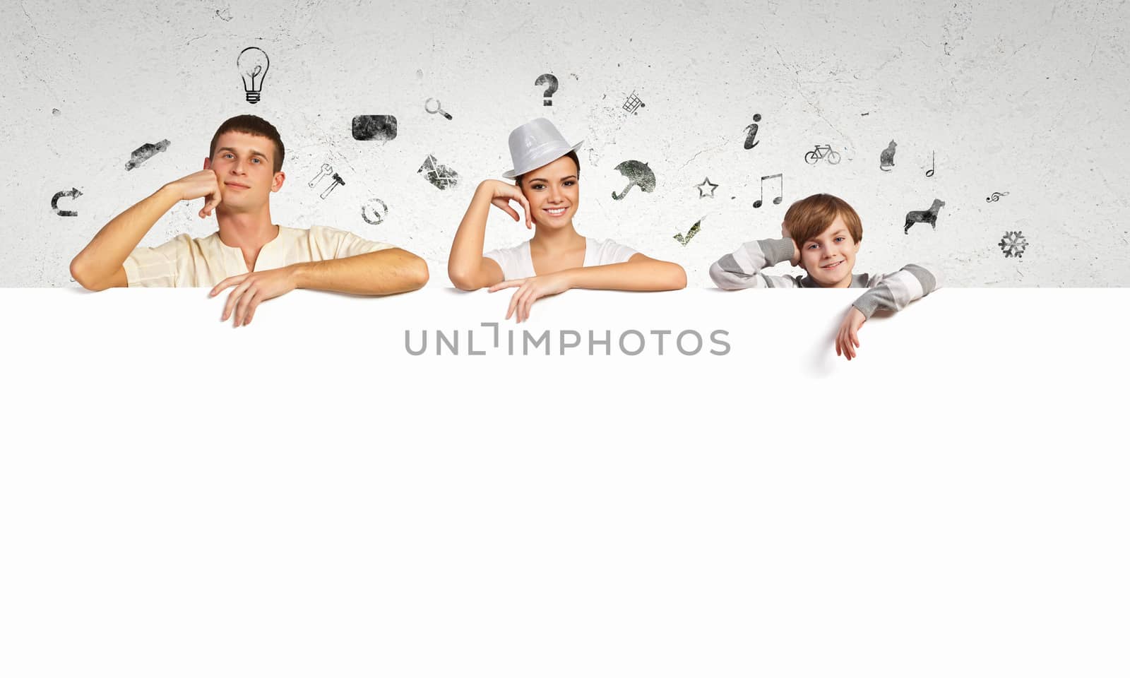 Happy young family with blank banner. Place for text