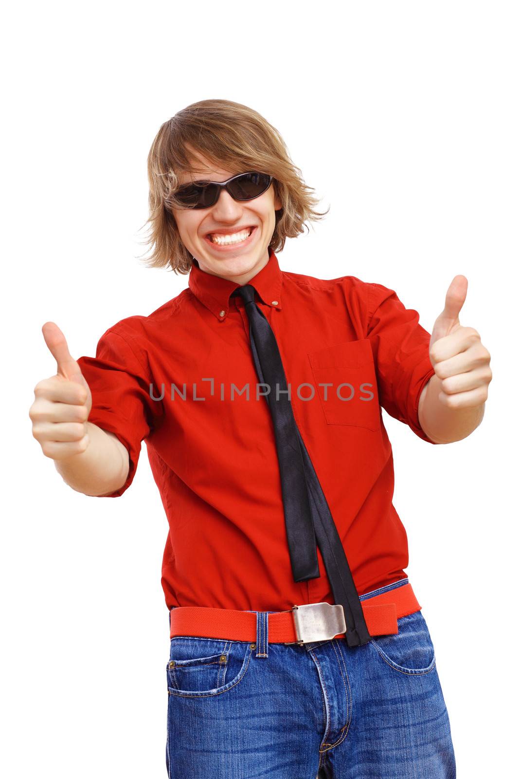 Happy smiling young man dancing and listening to music