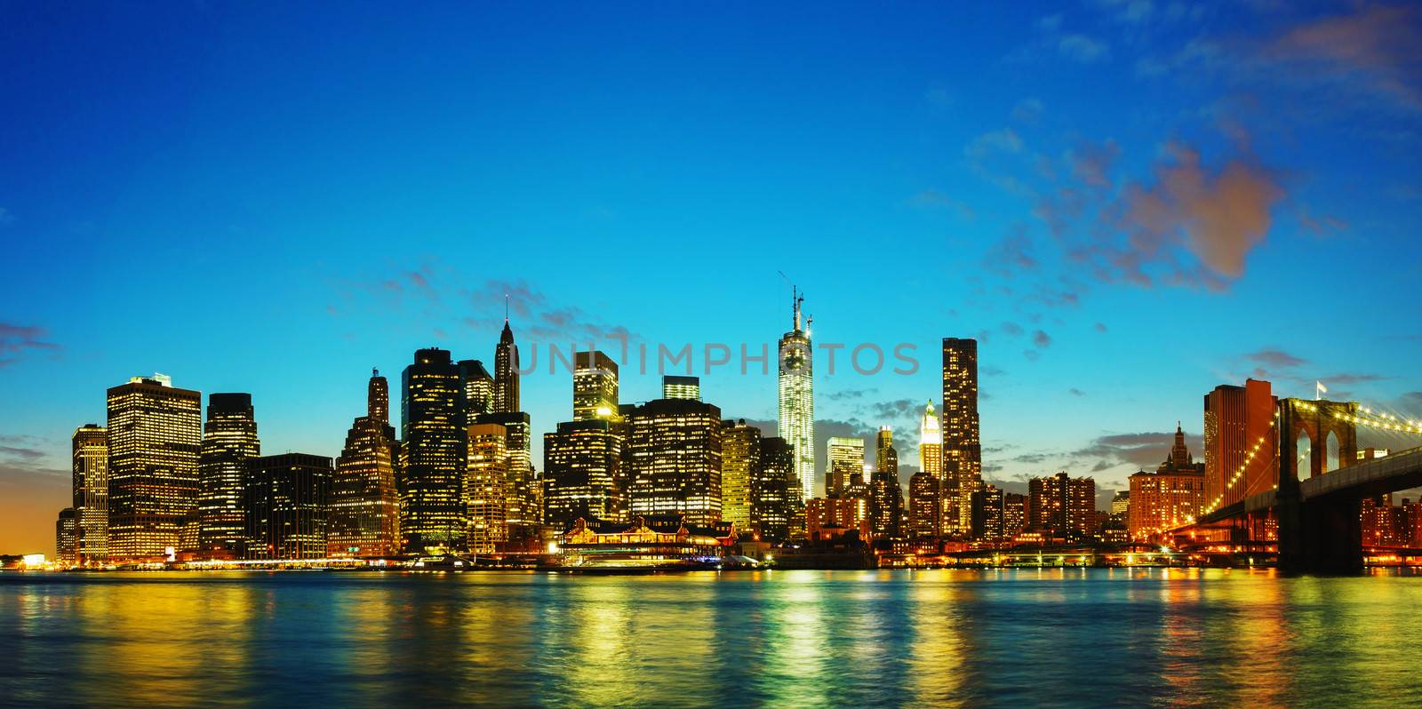 New York City cityscape at sunset by AndreyKr