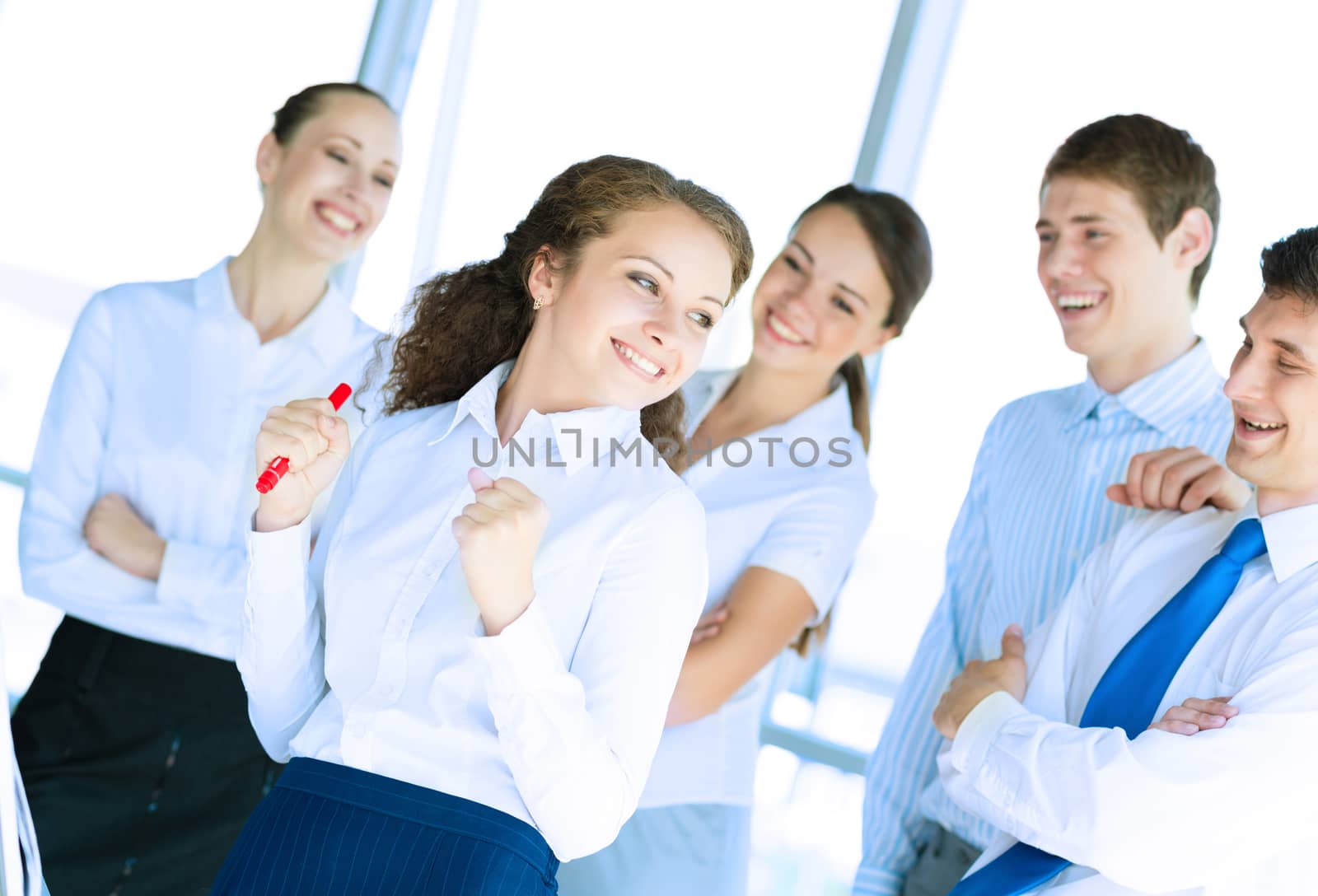 happy business woman standing next to their counterparts outside the flipchart achievements in business