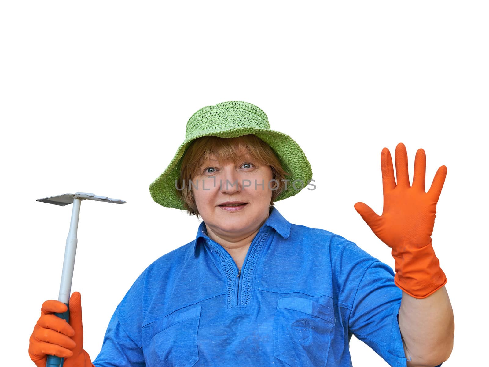 A smiling senior woman holding in hands garden tools. Image is isolated on white.