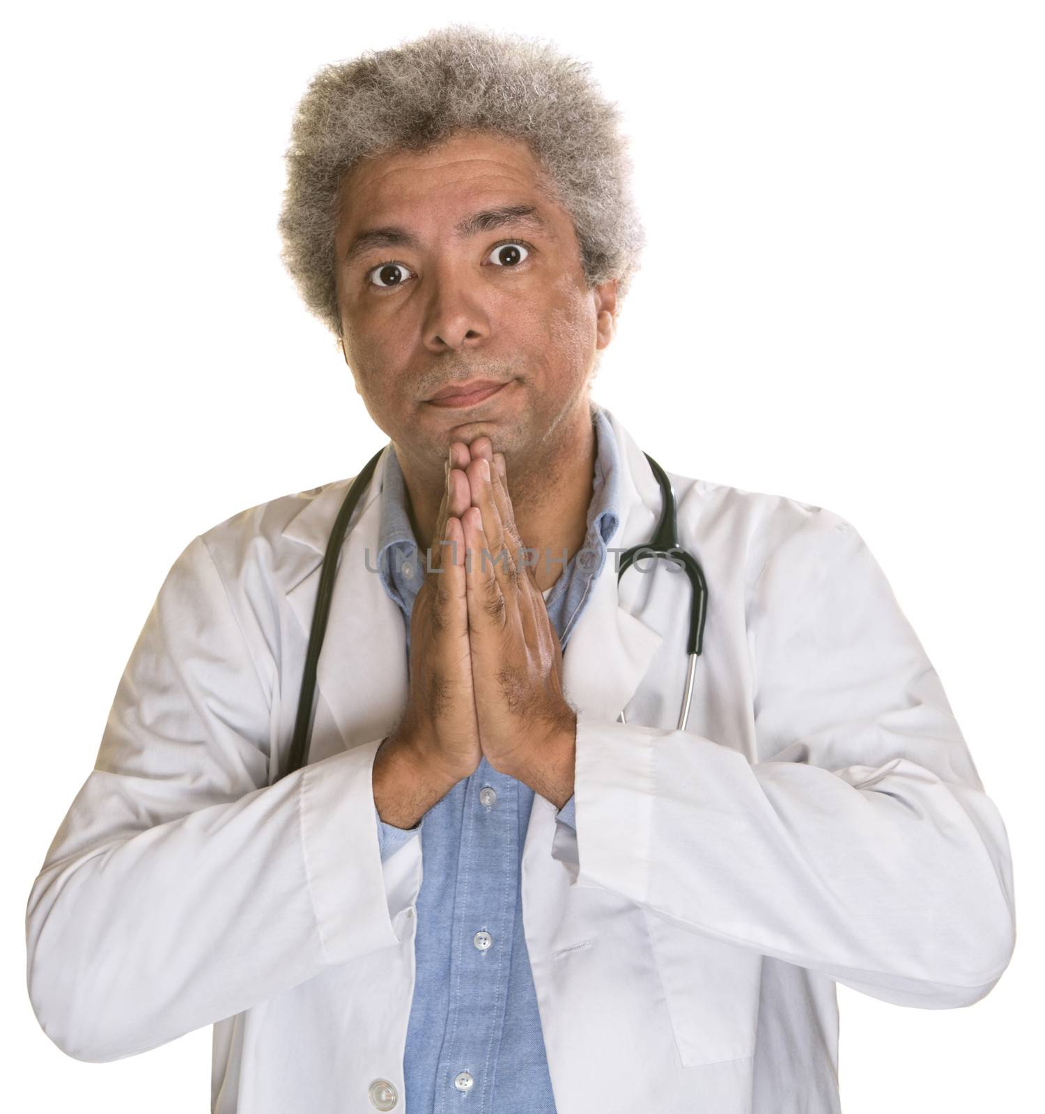 Wide eyed medical doctor with palms together