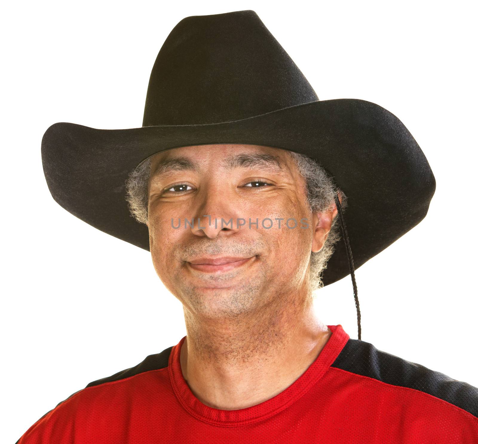 Cheerful handsome man in cowboy hat on white background