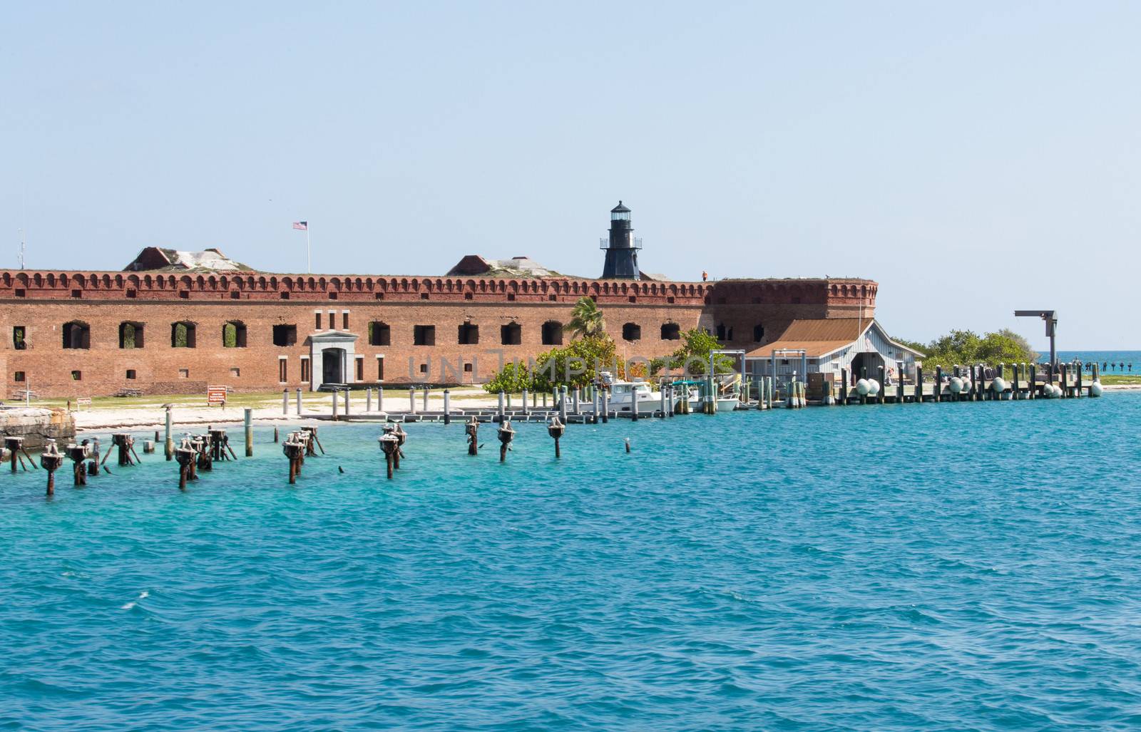 Garden Key in the Dry Tortugas is the site of the historic Fort Jefferson. Fort Jefferson is a massive but unfinished coastal fortress. It is the largest masonry structure in the Americas and is composed of over 16 million bricks. It nearly encompasses the entirety of Garden Key. Garden Key is one of the seven keys in the Dry Tortugas National Park. Although manned for several years, changes in naval warfare outmoded the fort before it could be completed.