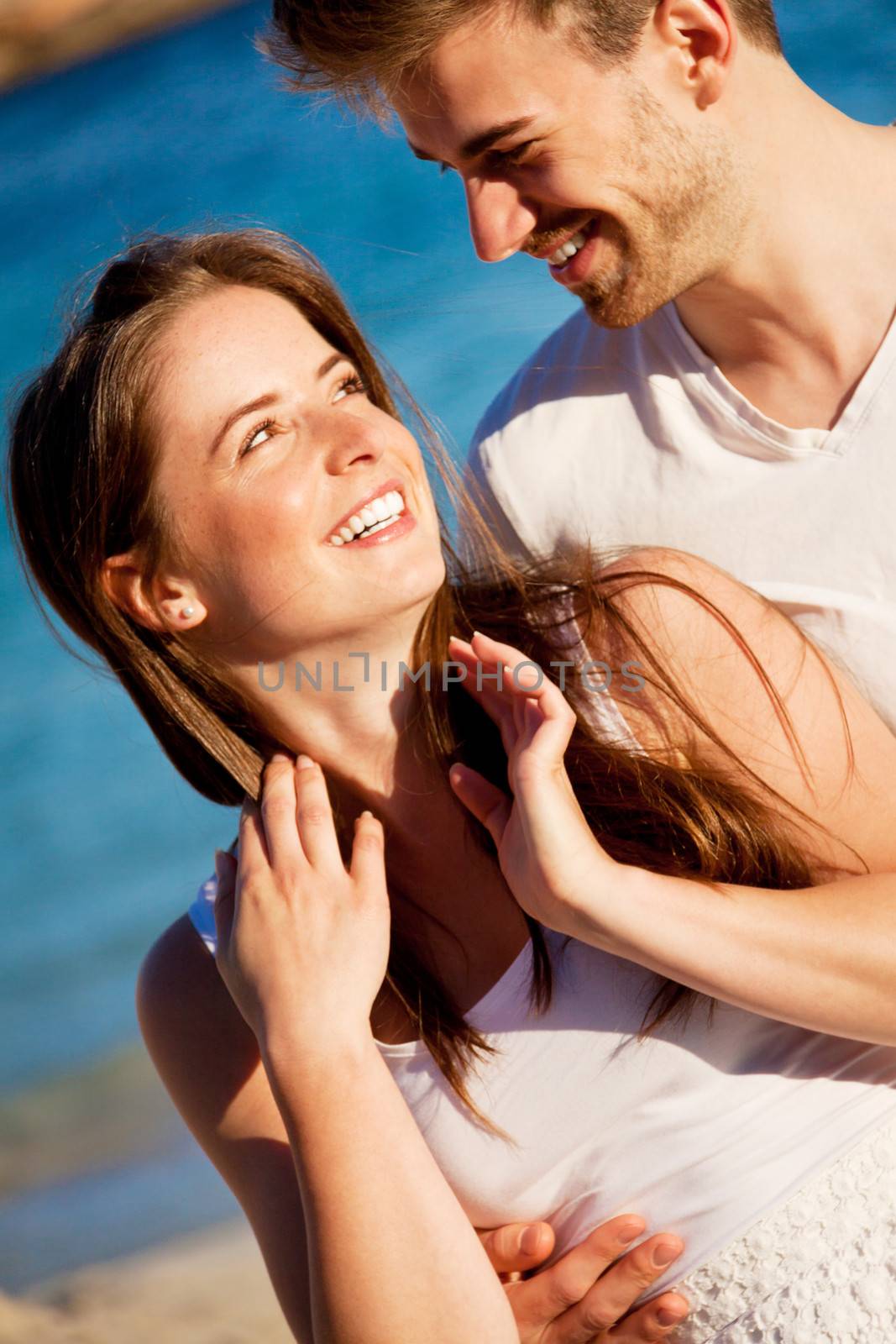 happy young couple having fun in summer holiday vacation love