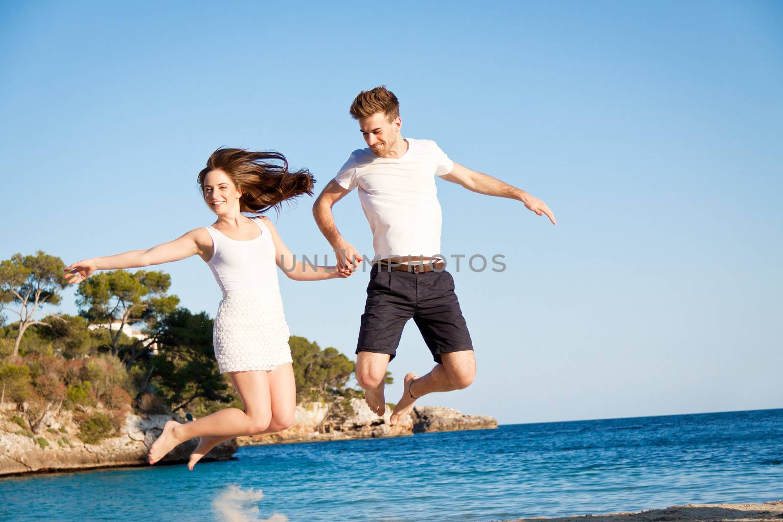 happy young couple having fun in summer holiday vacation love