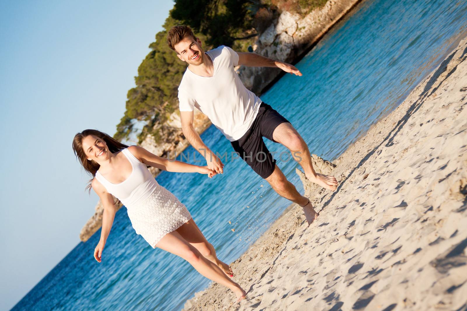 happy young couple having fun in summer holiday vacation love