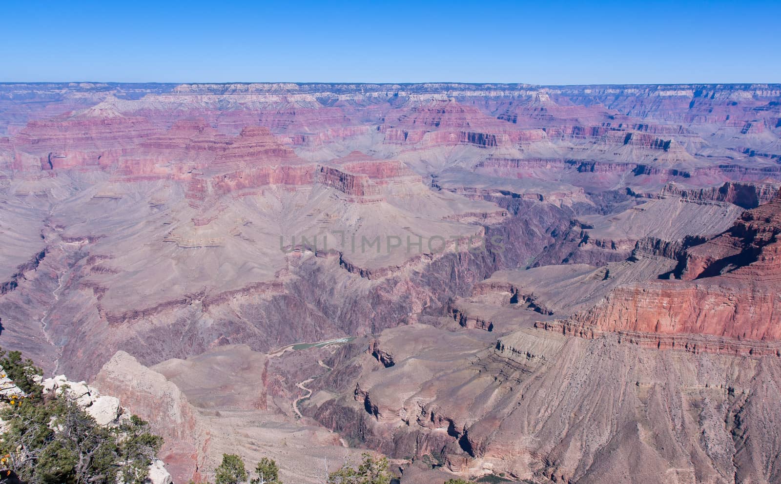 In this image can be seen many distinct layers dropping down to the Colorado River nearly a mile below.